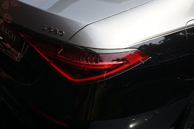 A close up of the tail lights of a car