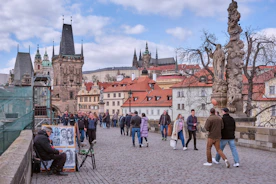 A group of people walking across a bridge
