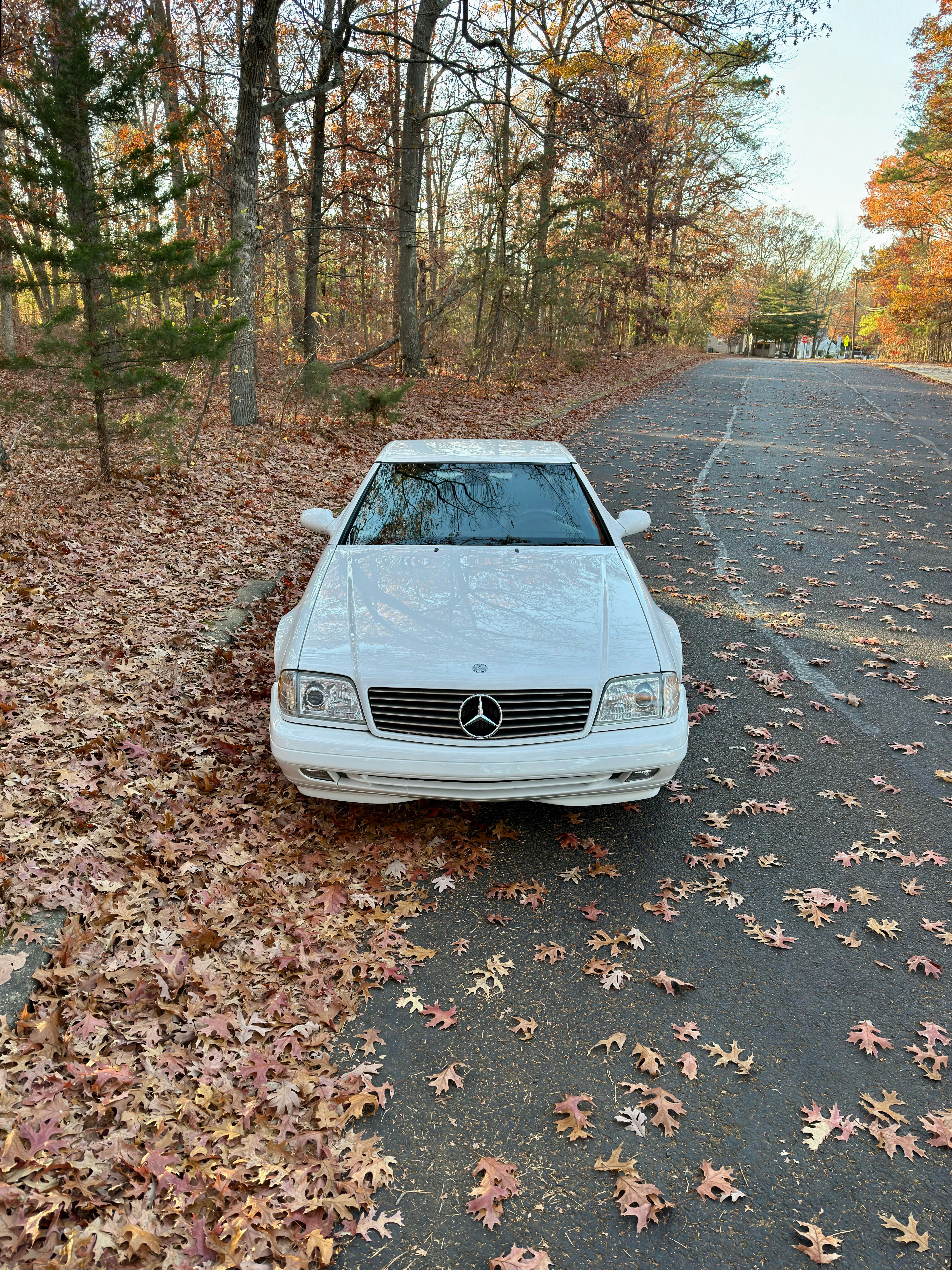 A white car parked on the side of a road photo – Free Car Image on Unsplash