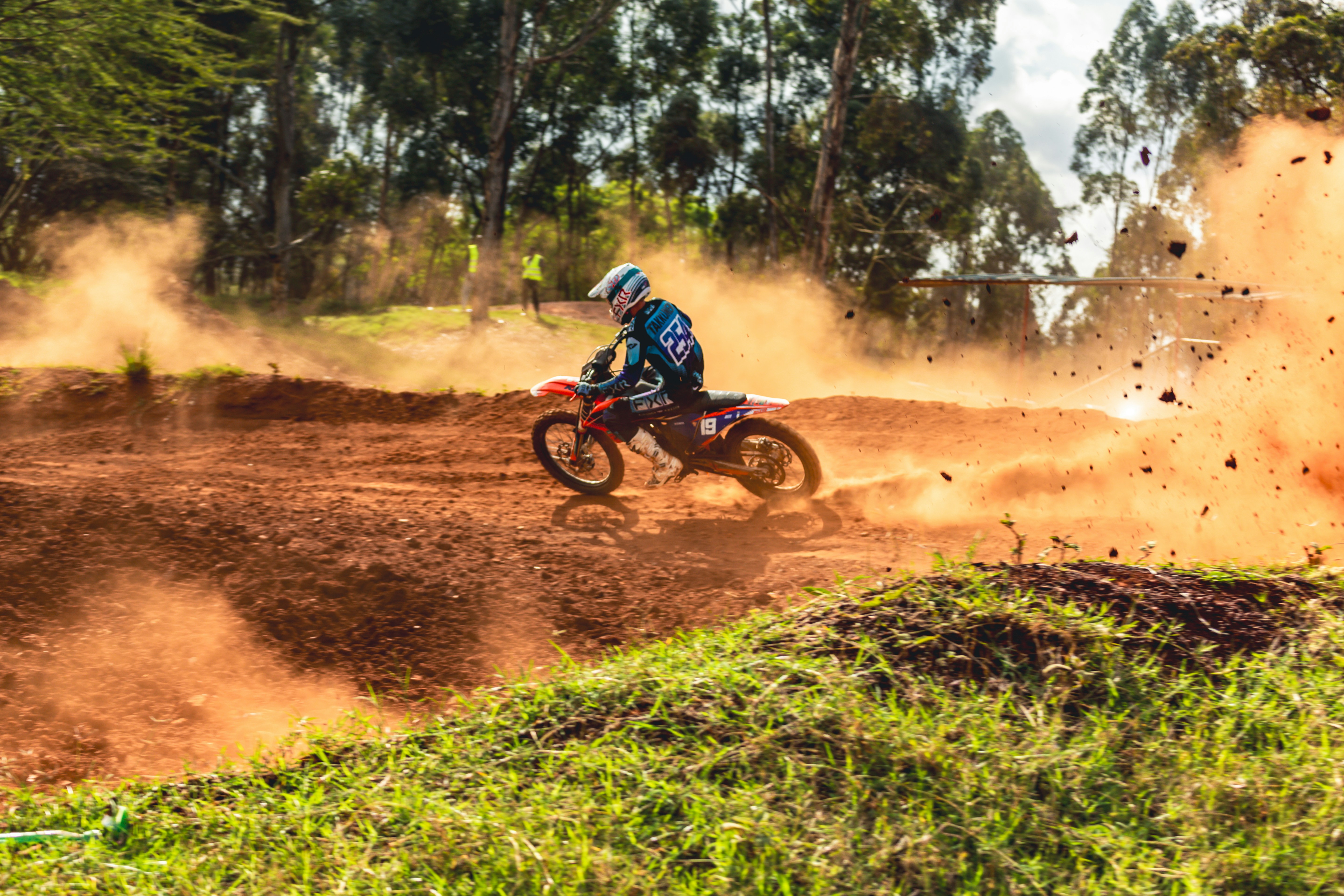 A person riding a dirt bike on a dirt track photo – Free Motorcycle ...