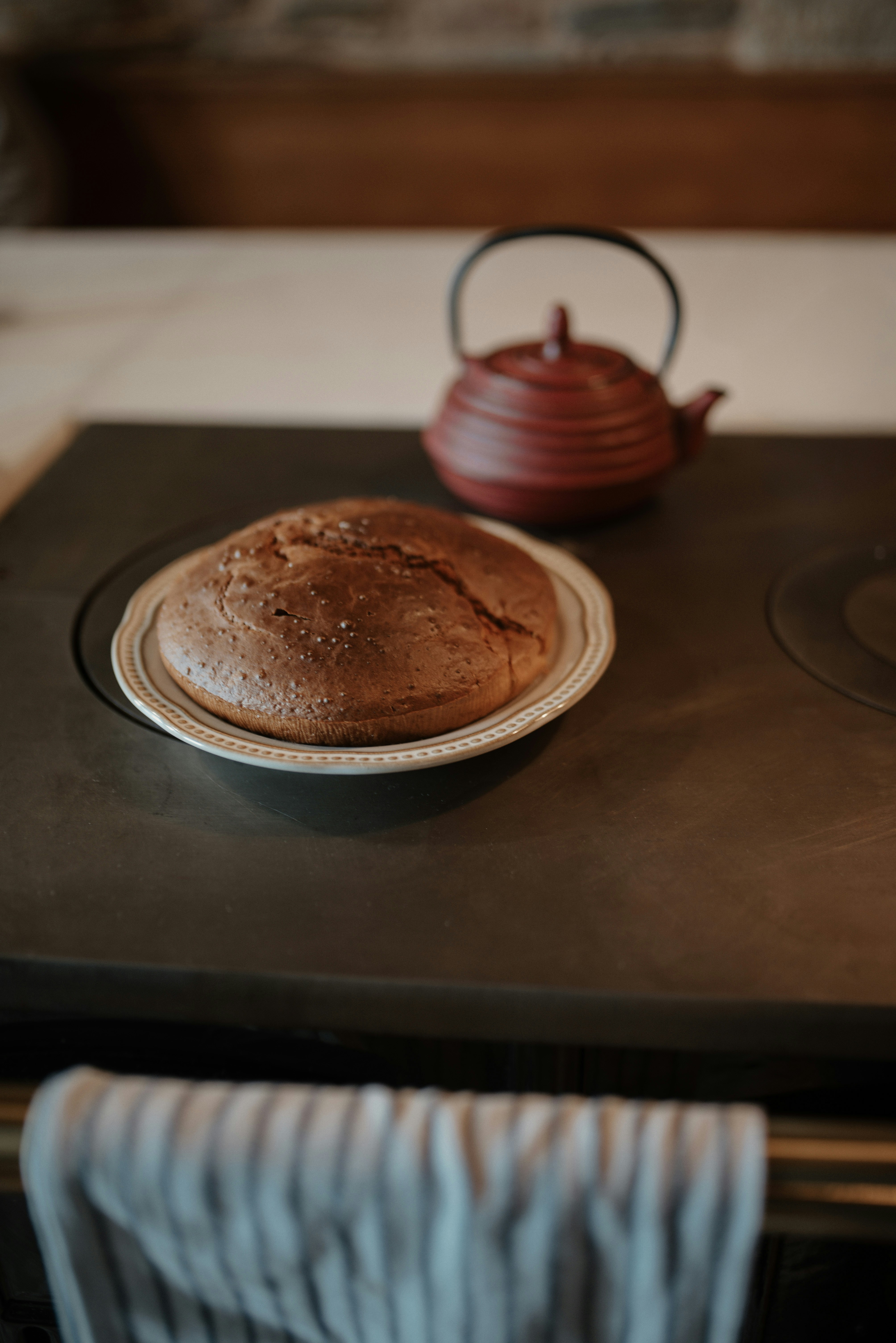 A plate of bread sitting on top of a stove
