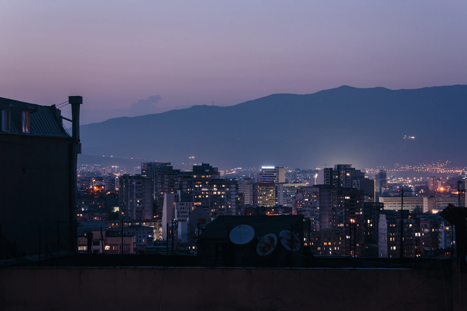 Tbilisi cityscape at night from a rooftop