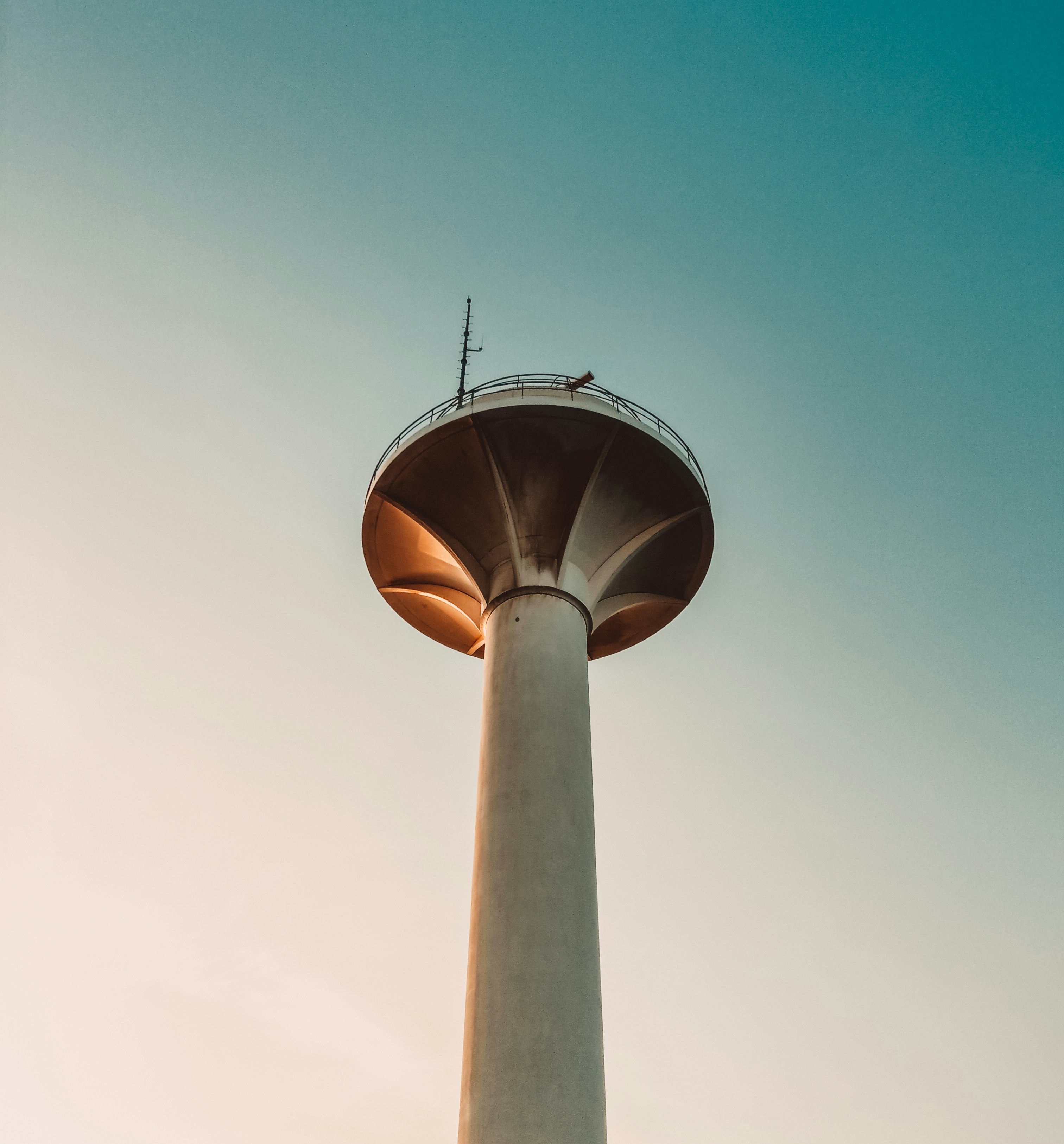 A tall tower with a sky background