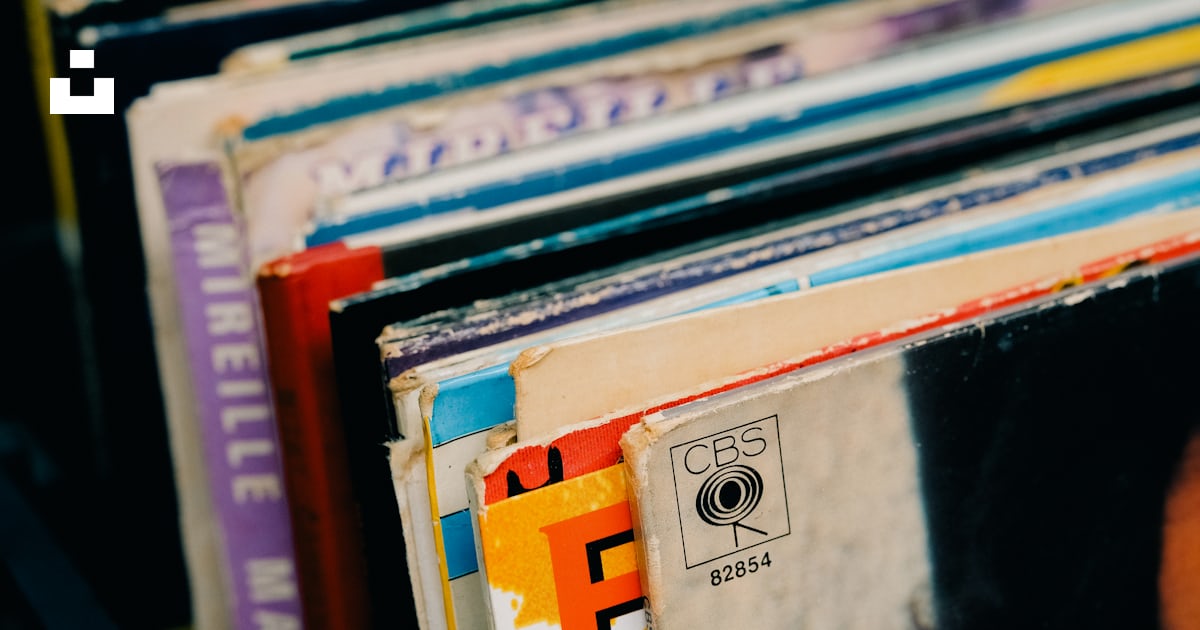 A close up of a stack of records photo – Free Details Image on Unsplash