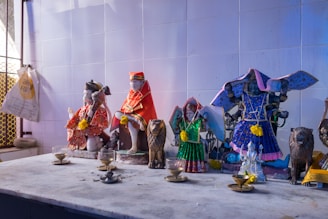 A group of figurines sitting on top of a table