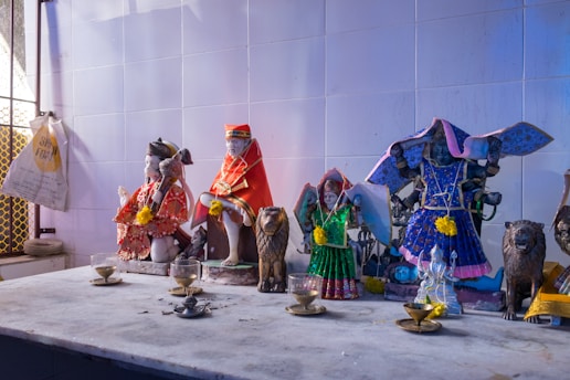A group of figurines sitting on top of a table