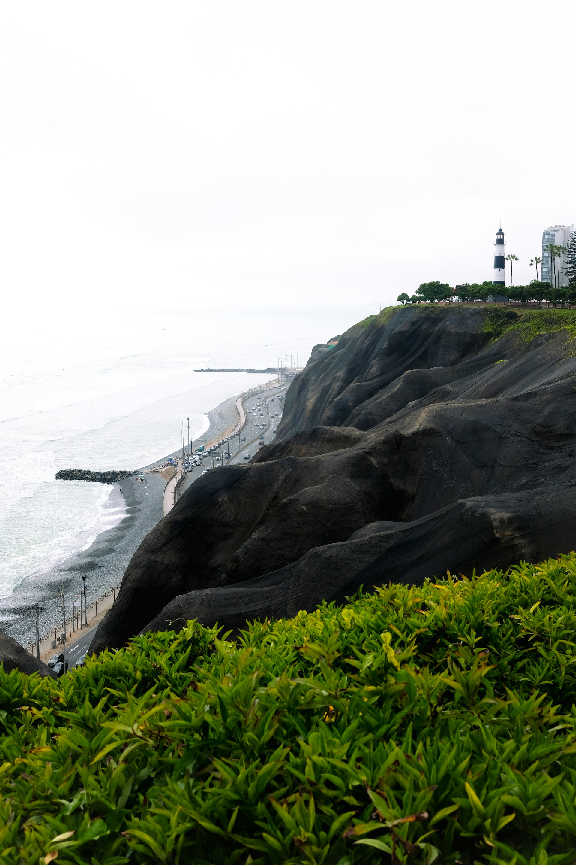 A view of the ocean from the top of a hill