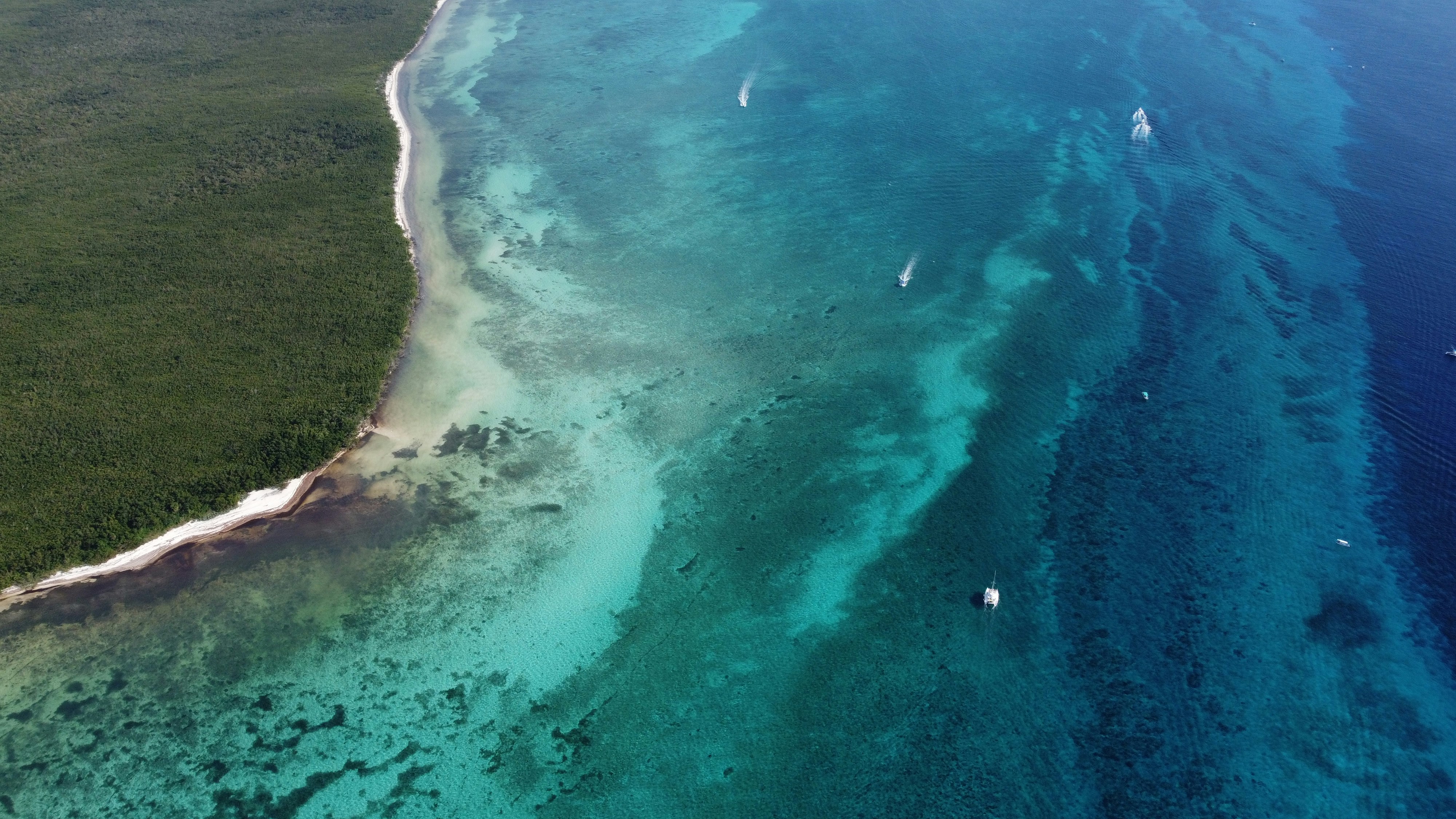 An aerial view of the ocean and land