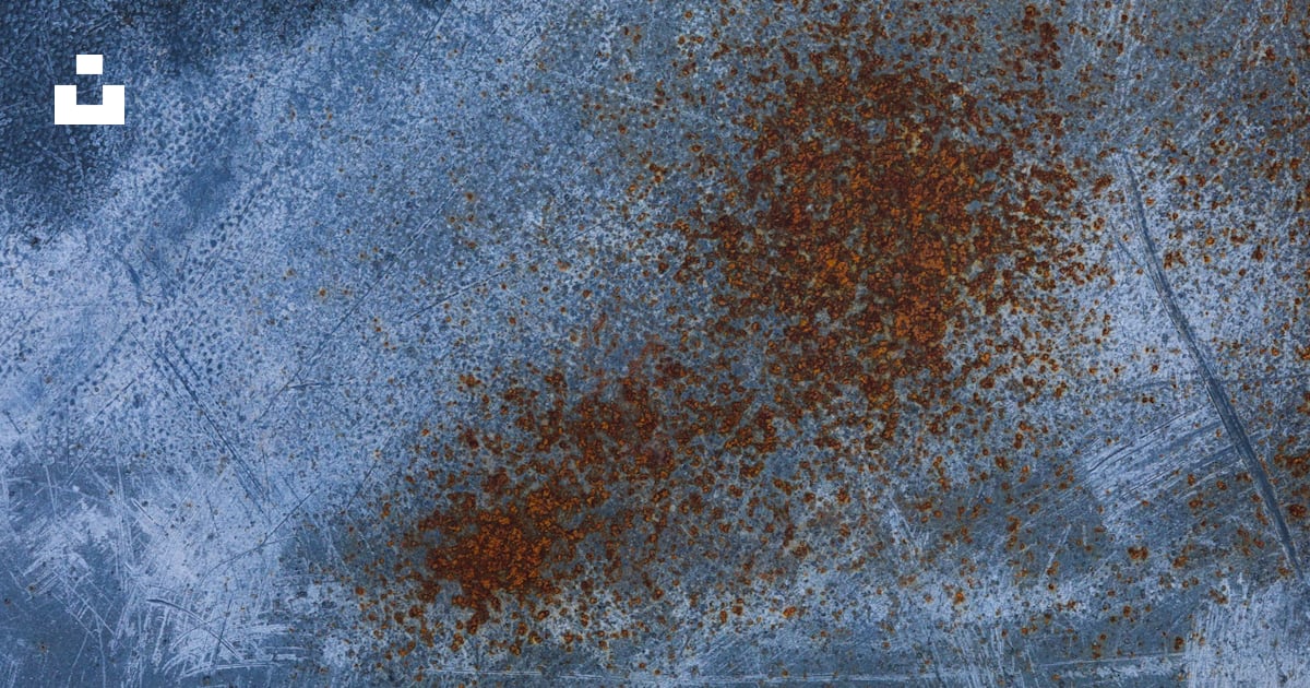 A rusted metal surface with rust on it photo – Free Wallpaper Image on ...