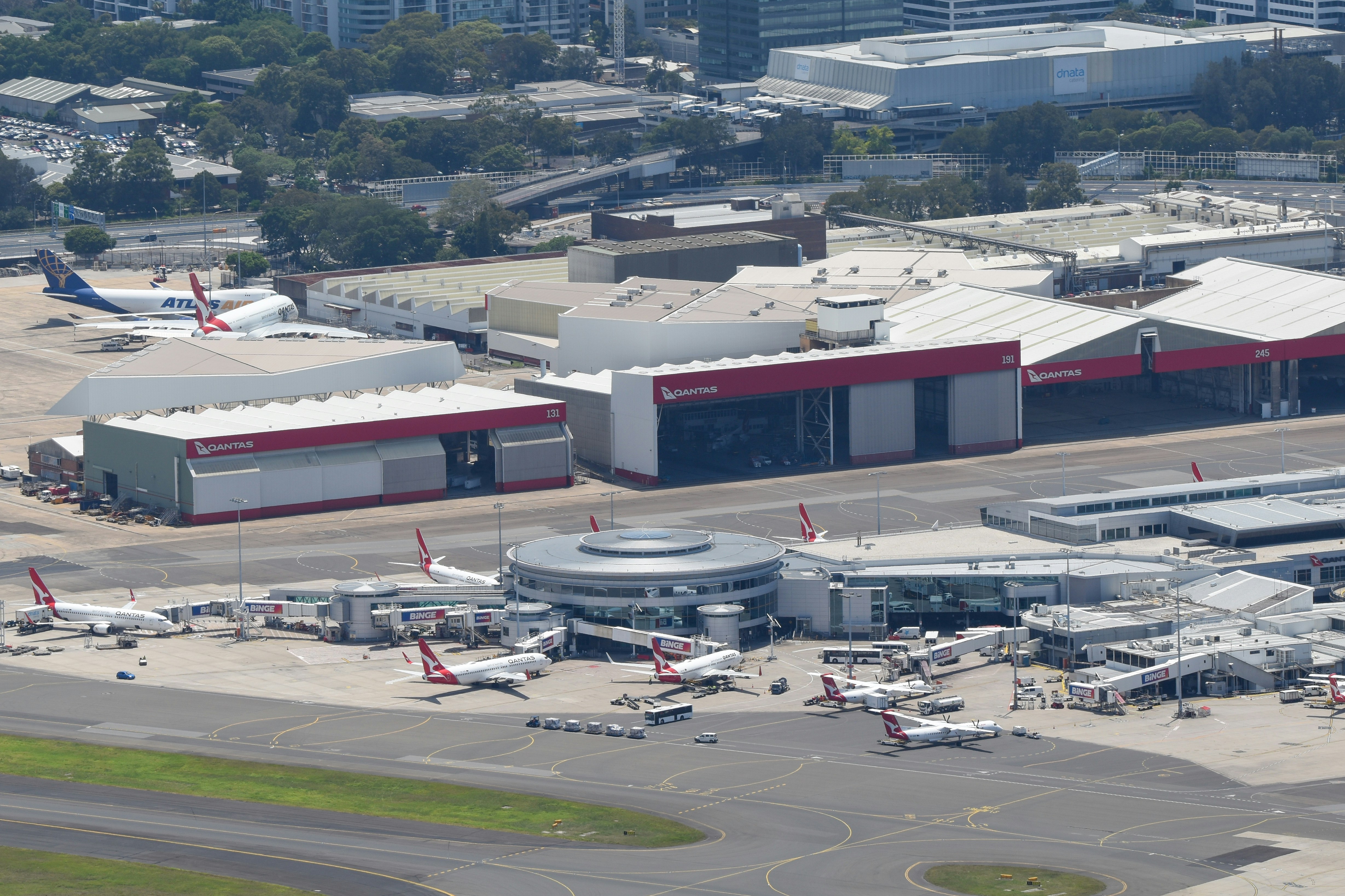 An aerial view of an airport with planes parked