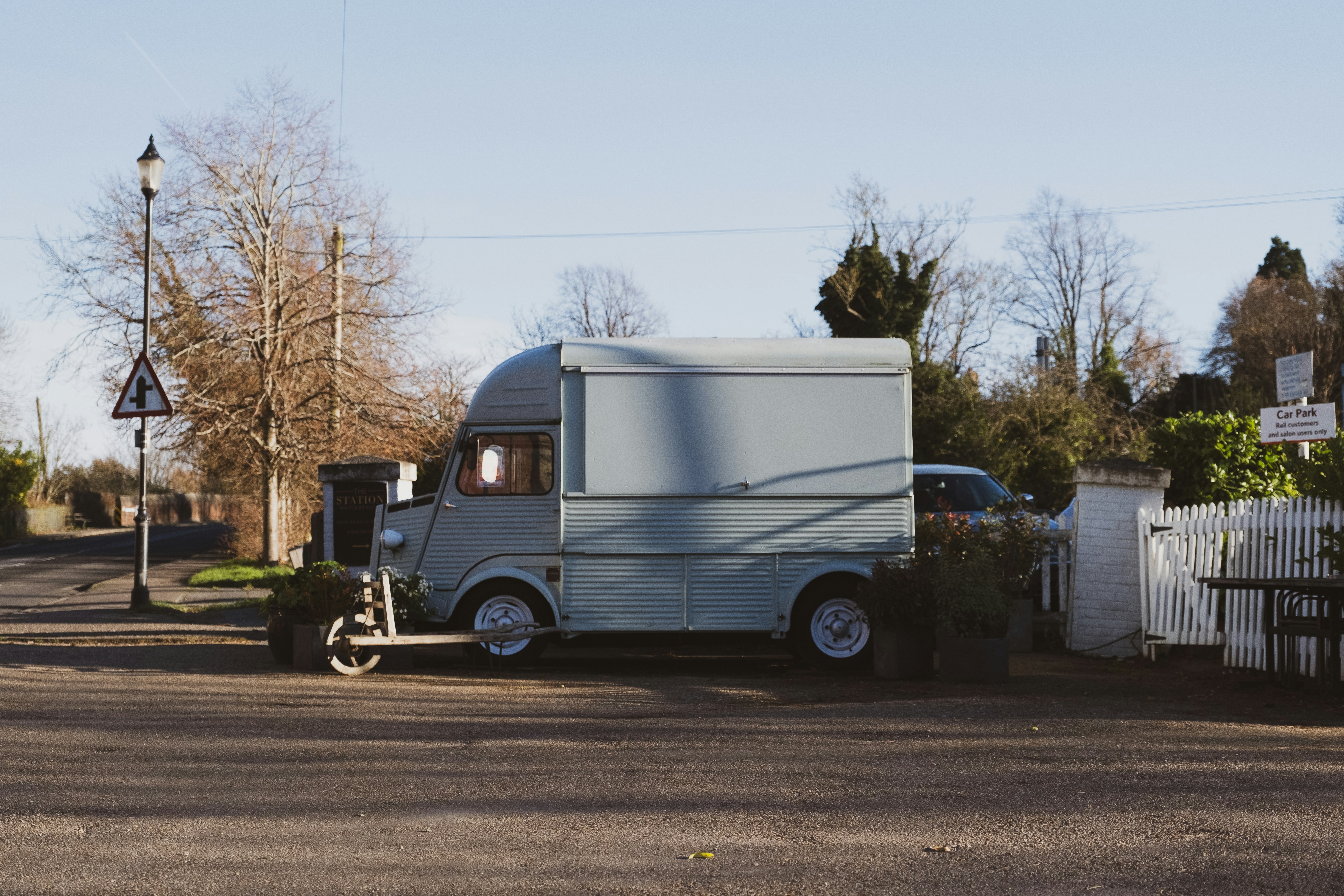 A small, towable refrigerated trailer set up at a business location, highlighting its portability and ease of access. - cold storage trailer rental wilmington