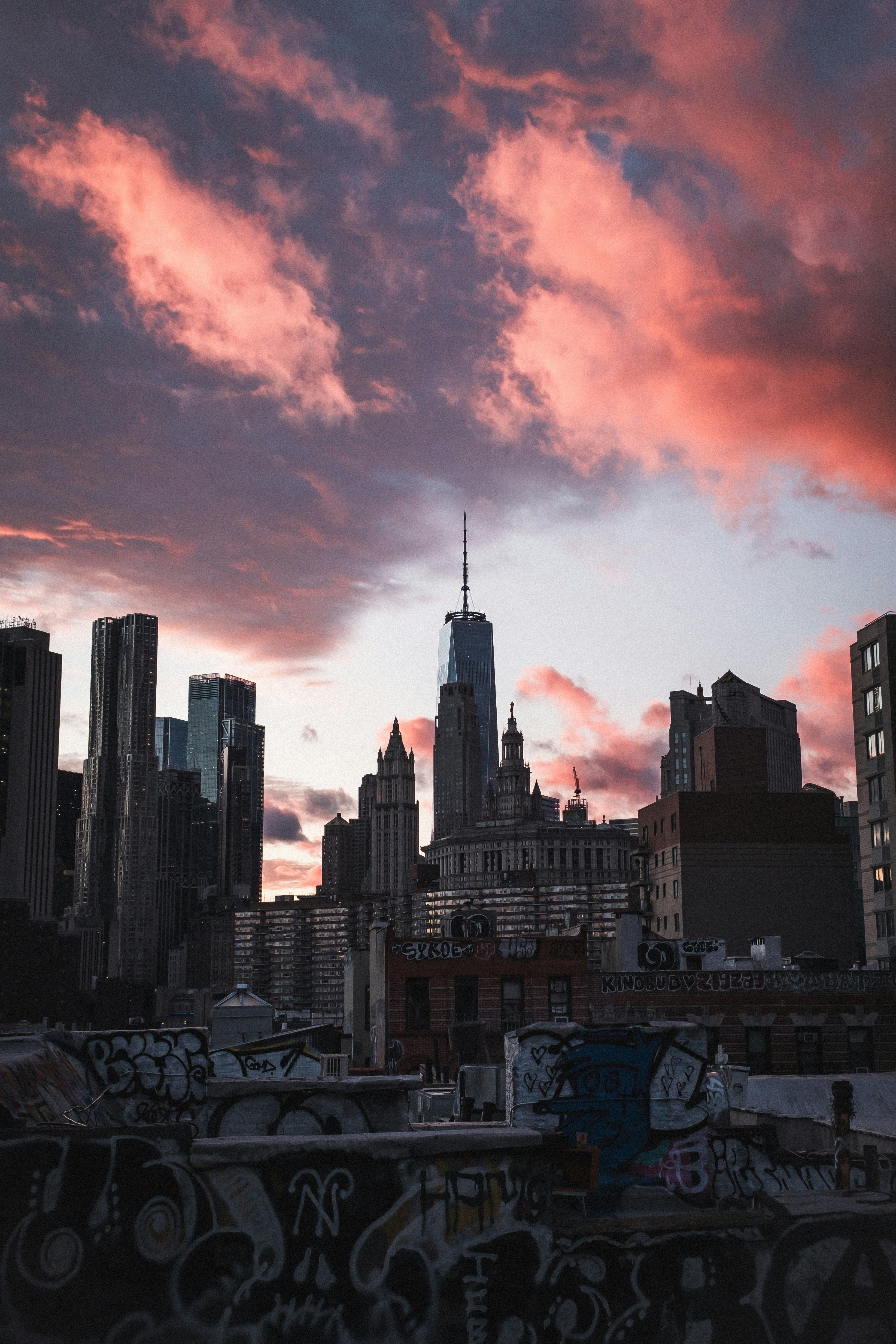 A view of a city skyline at sunset