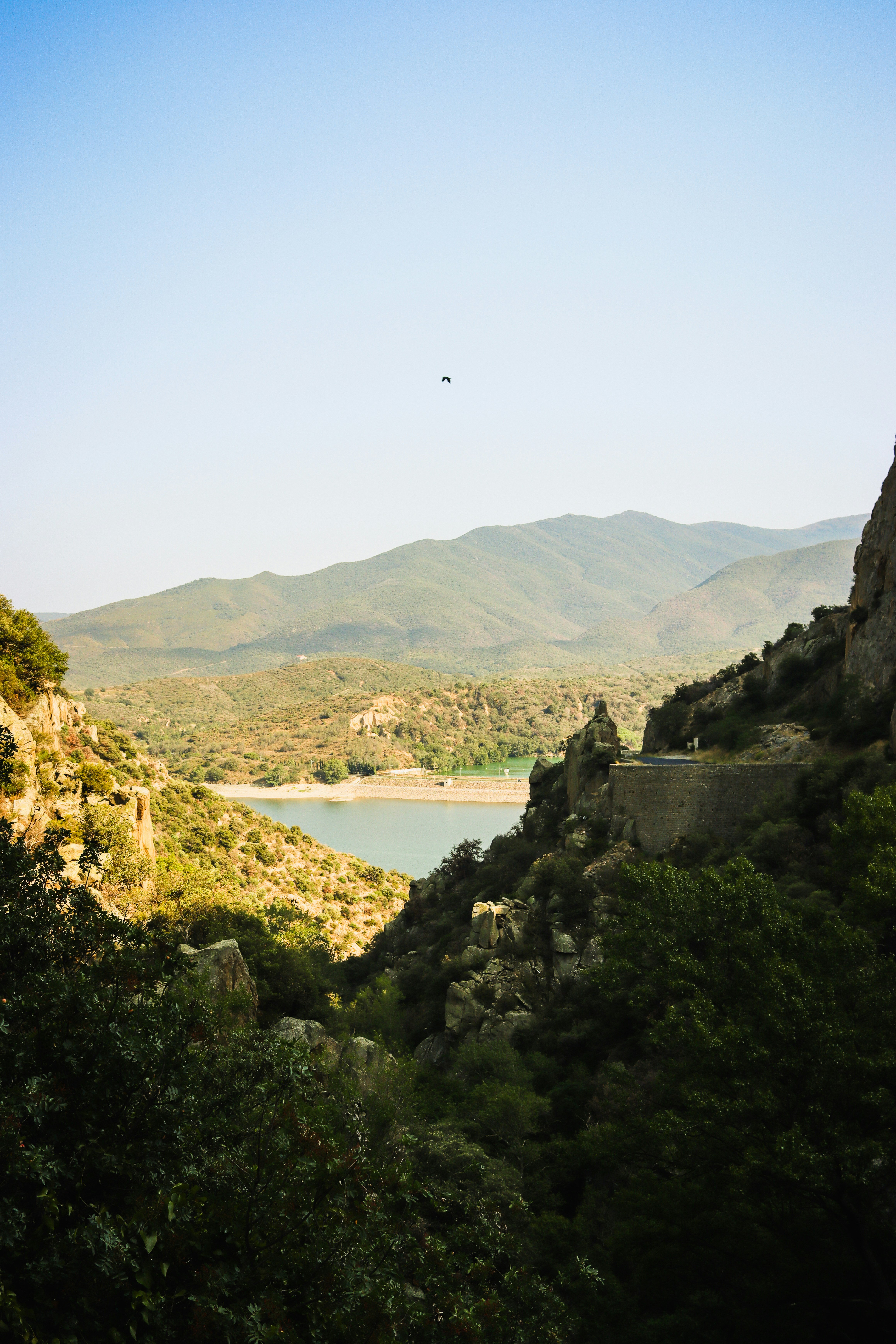 A scenic view of a river and mountains