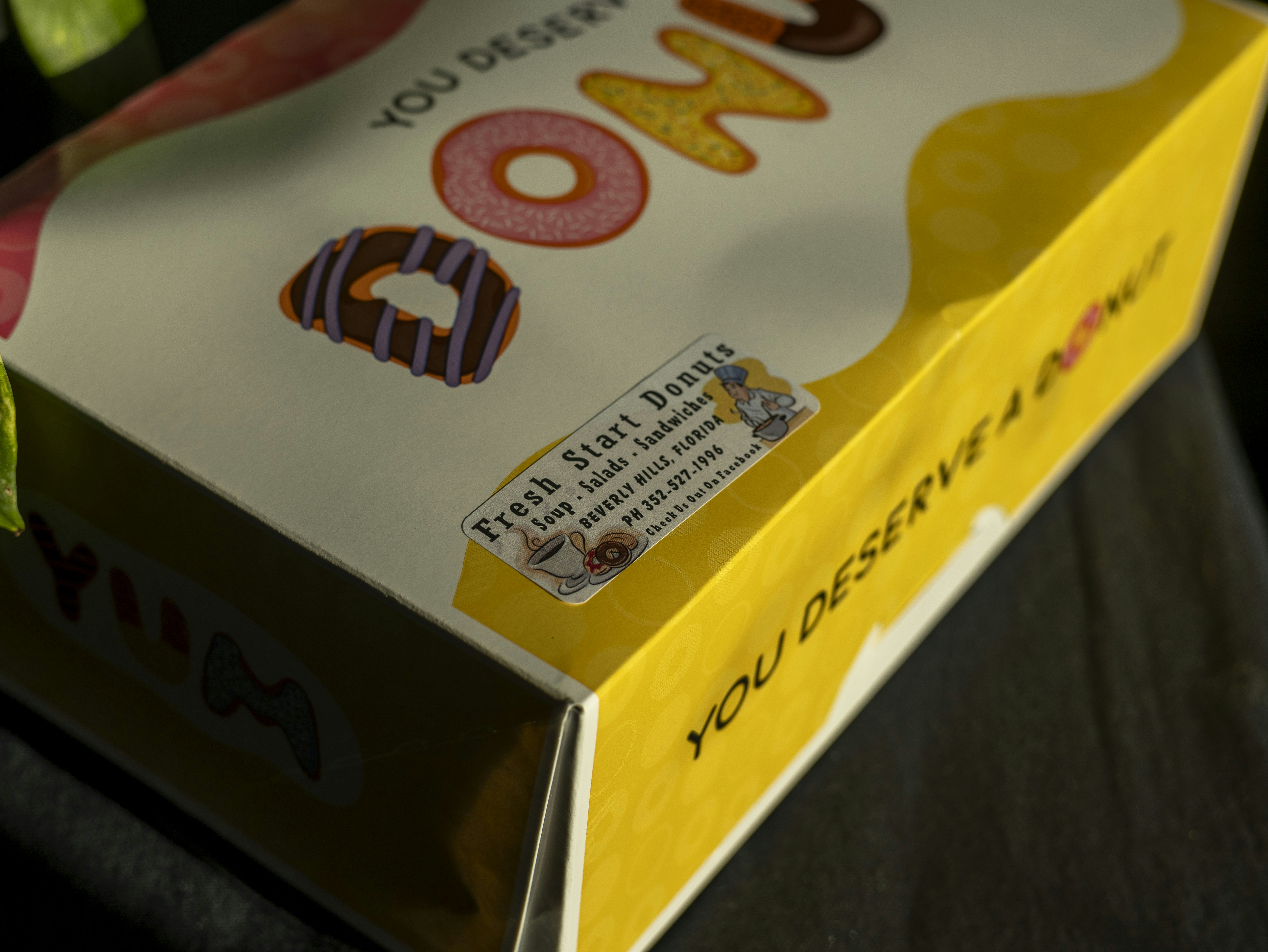 A box with a flower inside of it