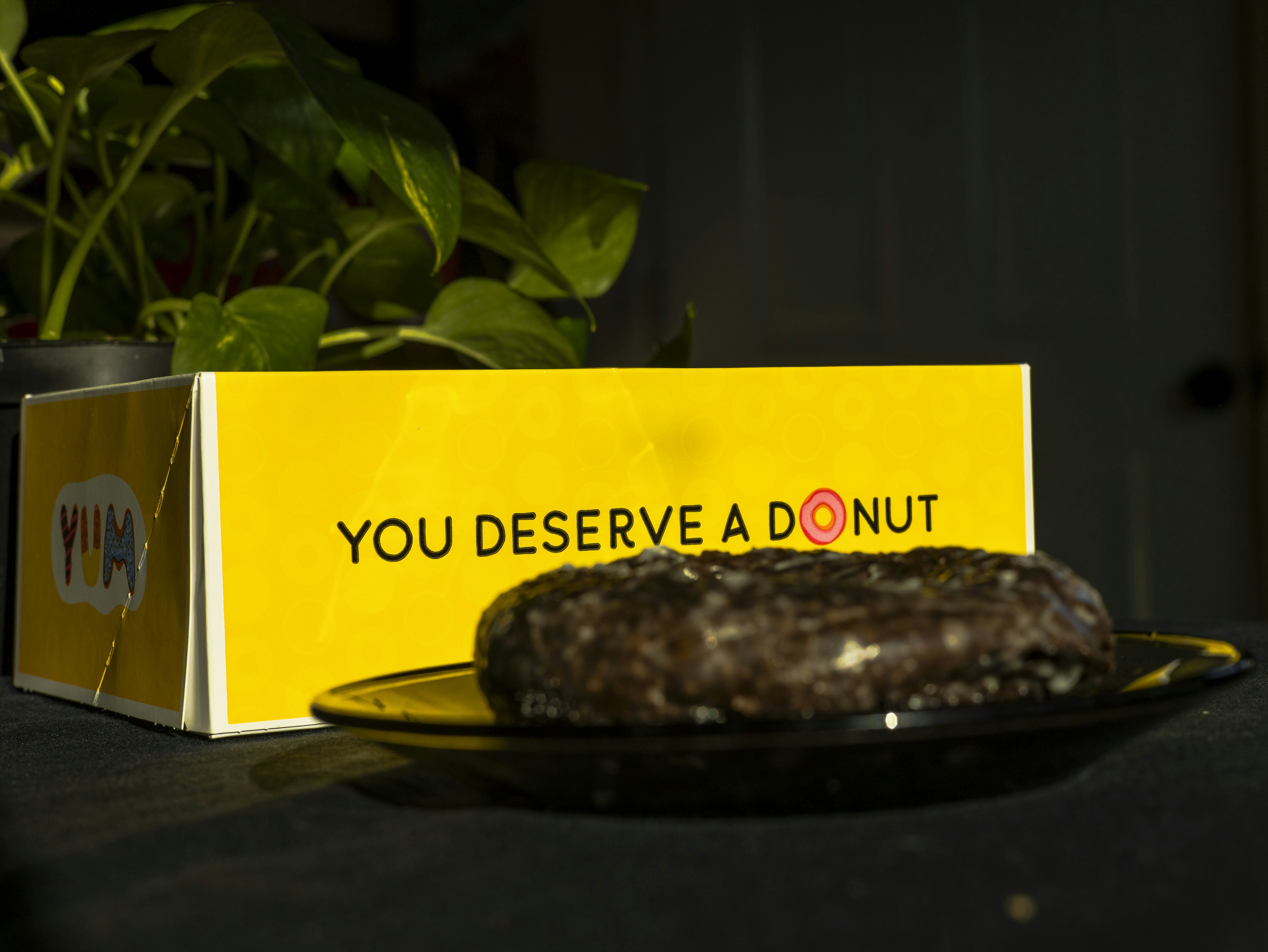 A box of donuts sitting on top of a table