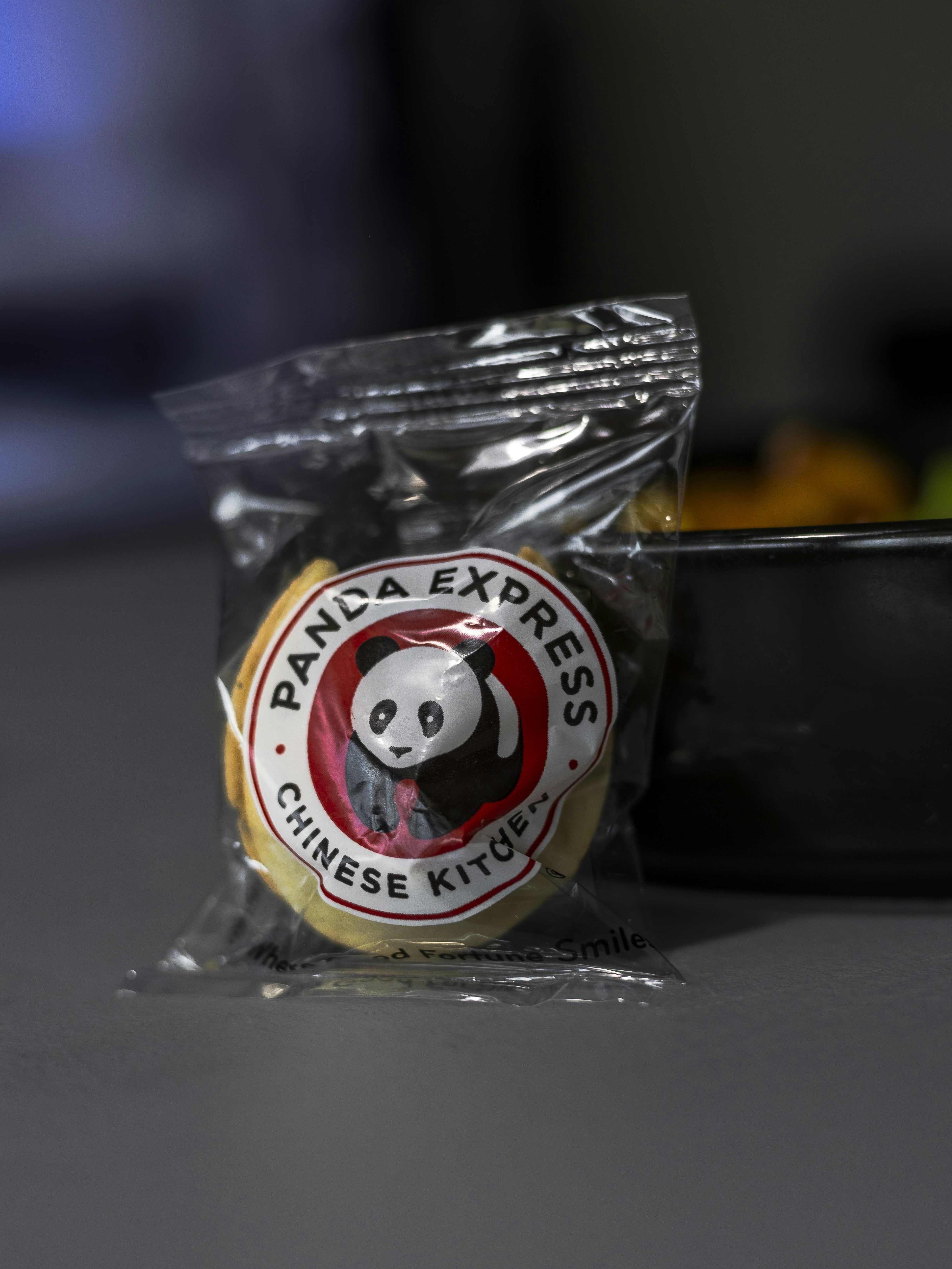 A bag of panda express chinese kits sitting on a table