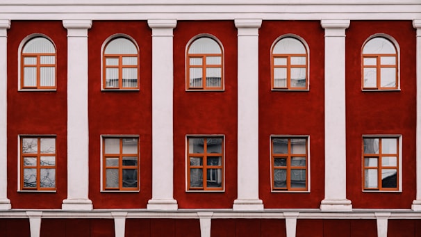 A red and white building with multiple windows