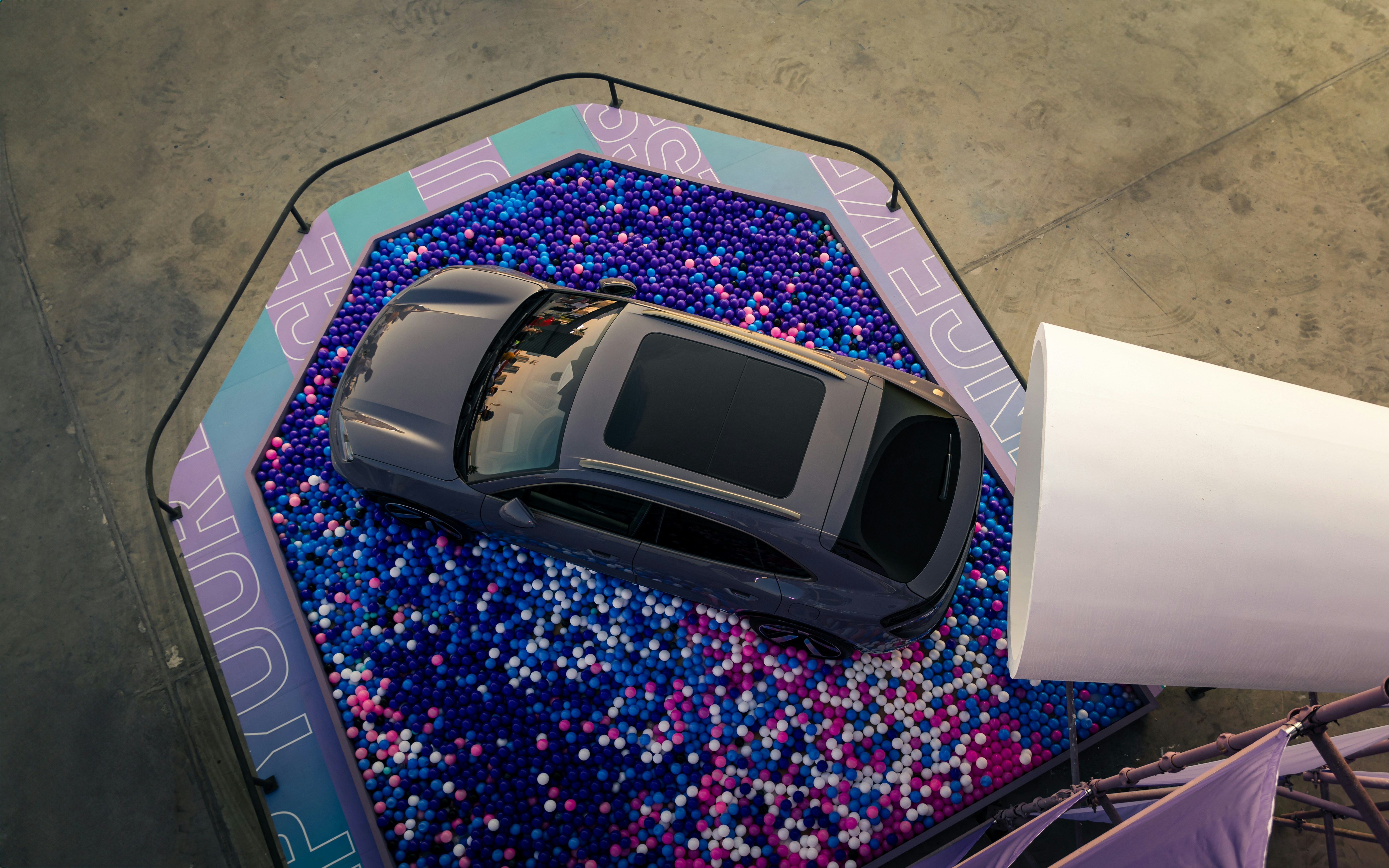 An overhead view of a car on a street