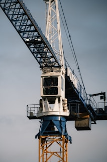 A crane that is sitting on top of a building