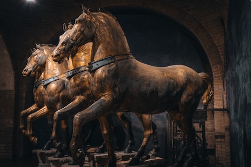 A group of horses standing next to each other