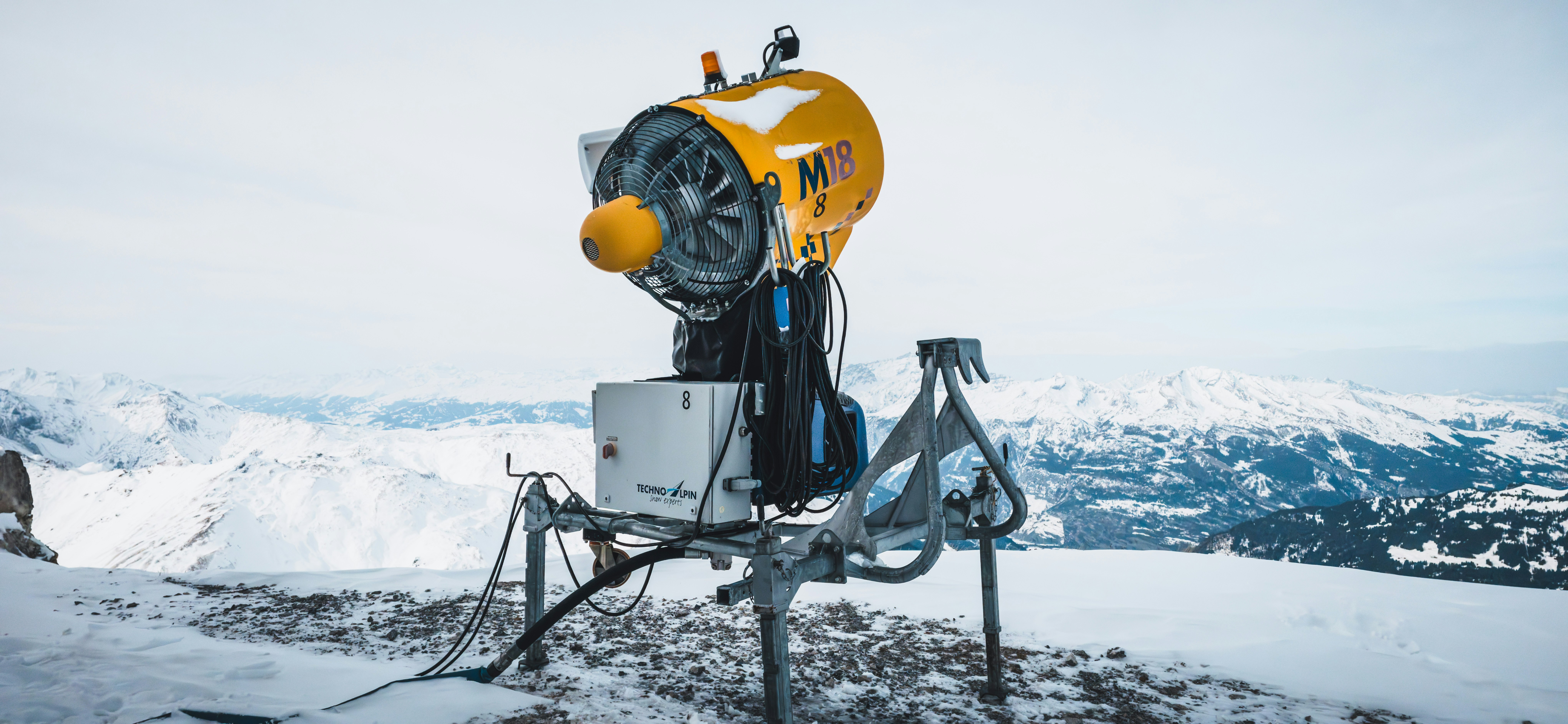 A telescope on top of a snowy mountain