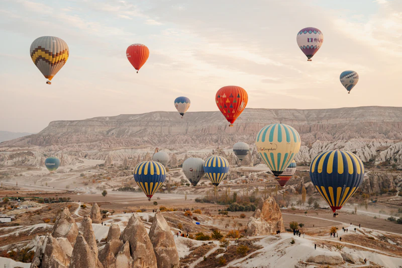 Hot air balloons over Cappadocia at sunrise