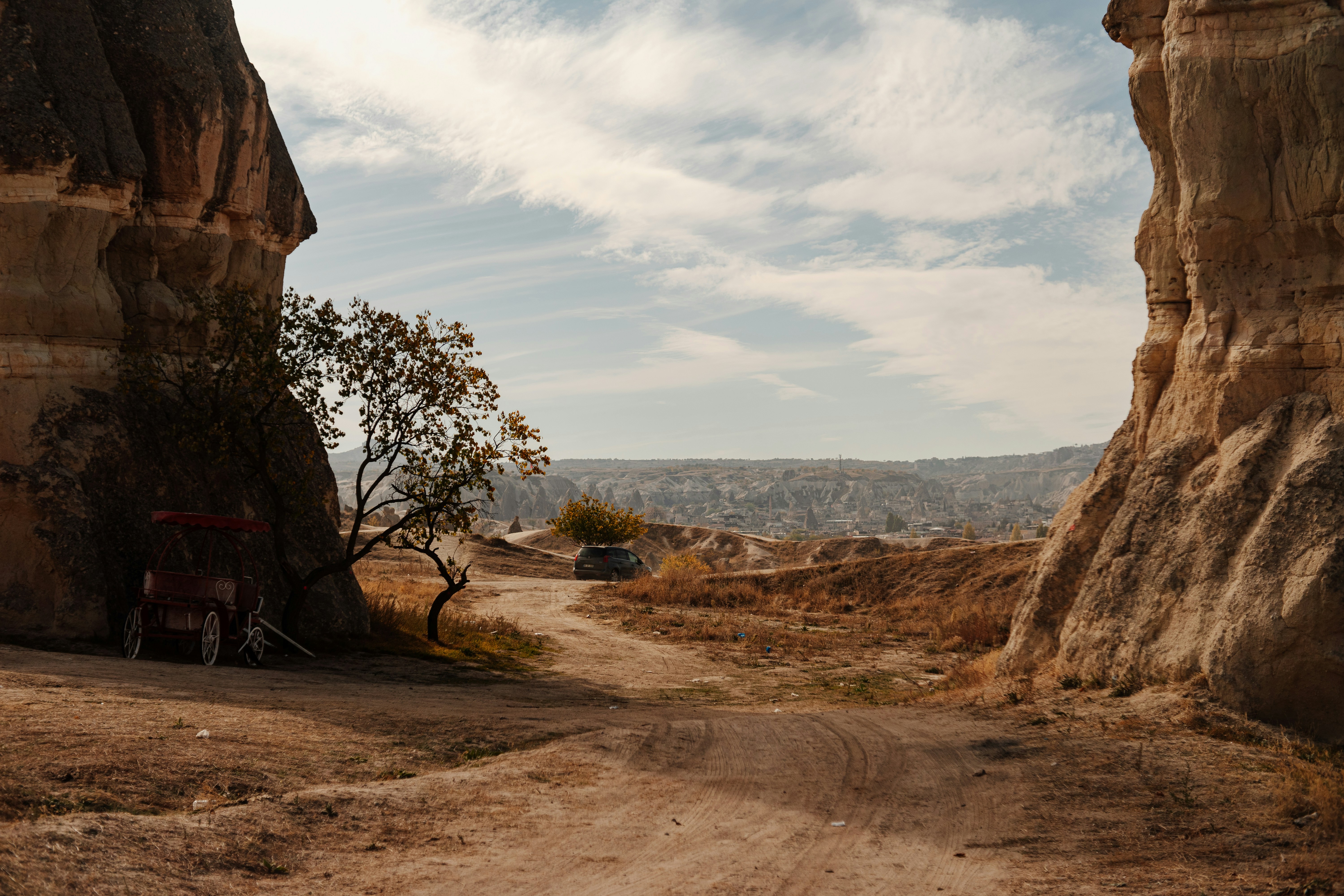 A dirt road between two large rocks photo – Free Göreme Image on Unsplash