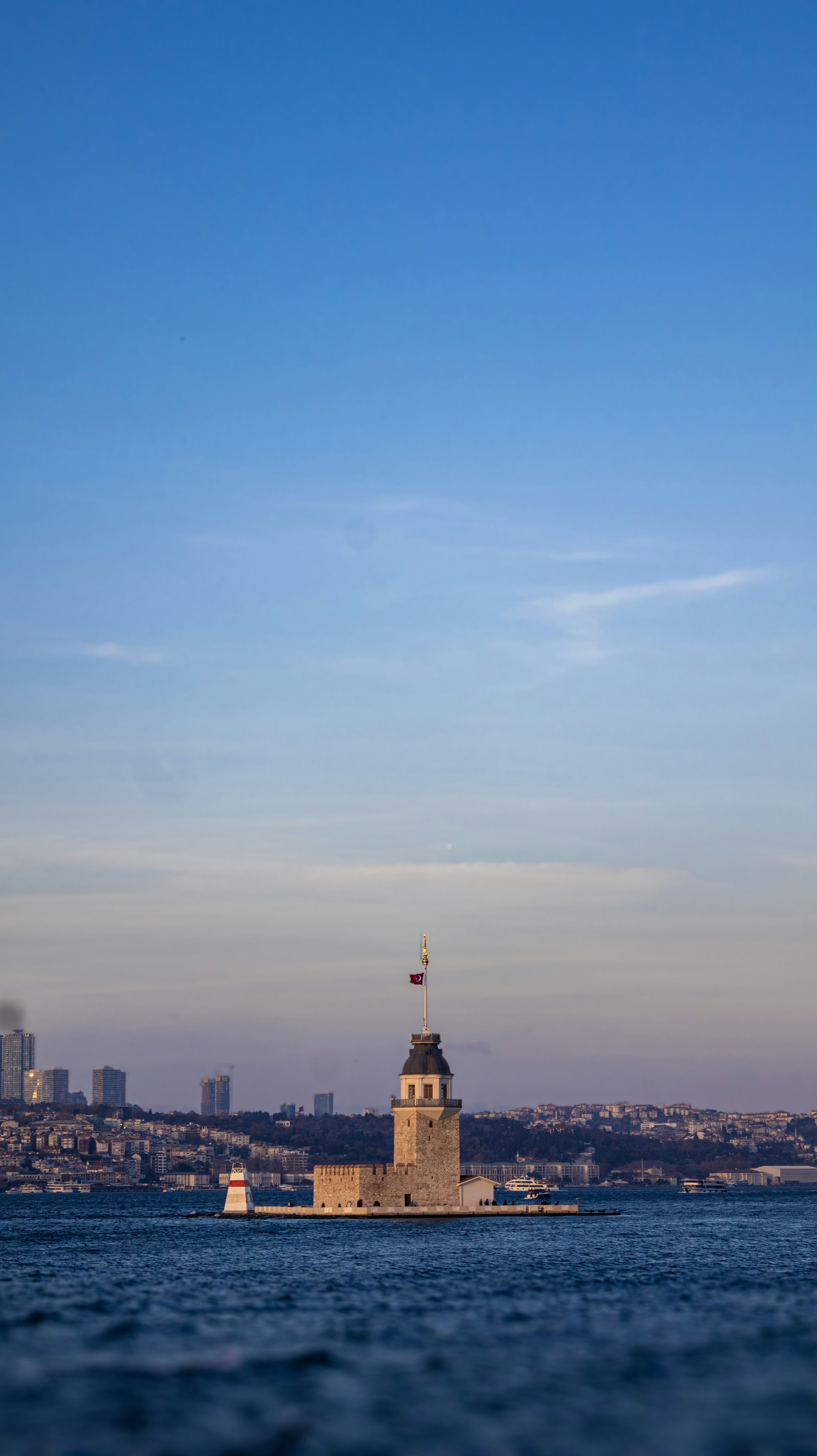 A large body of water with a tower in the middle of it