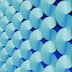 A blue wall with circles on it