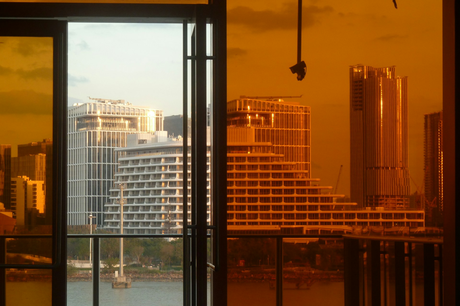 A view of a city from a hotel room