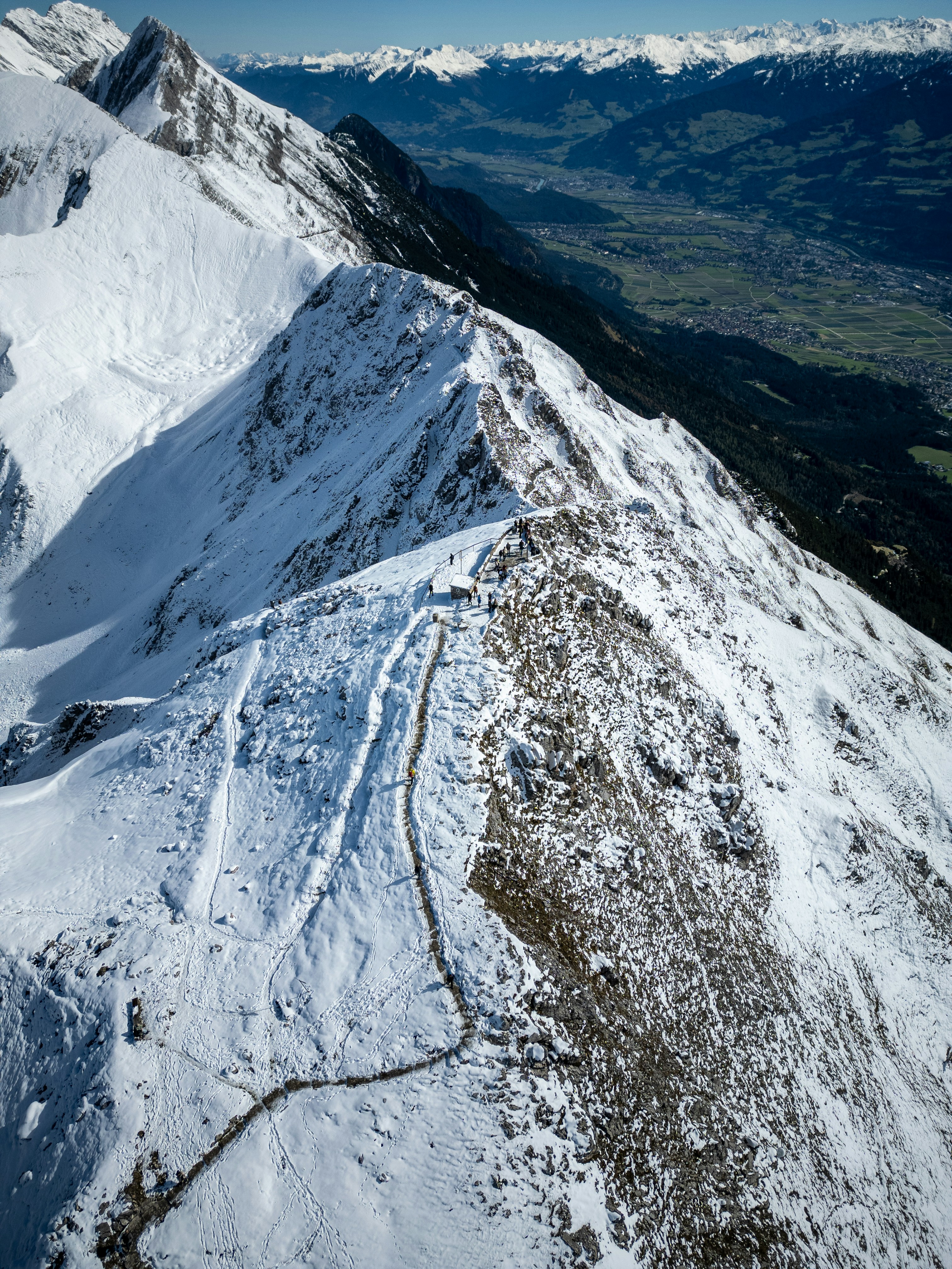 A snow covered mountain with a sky background