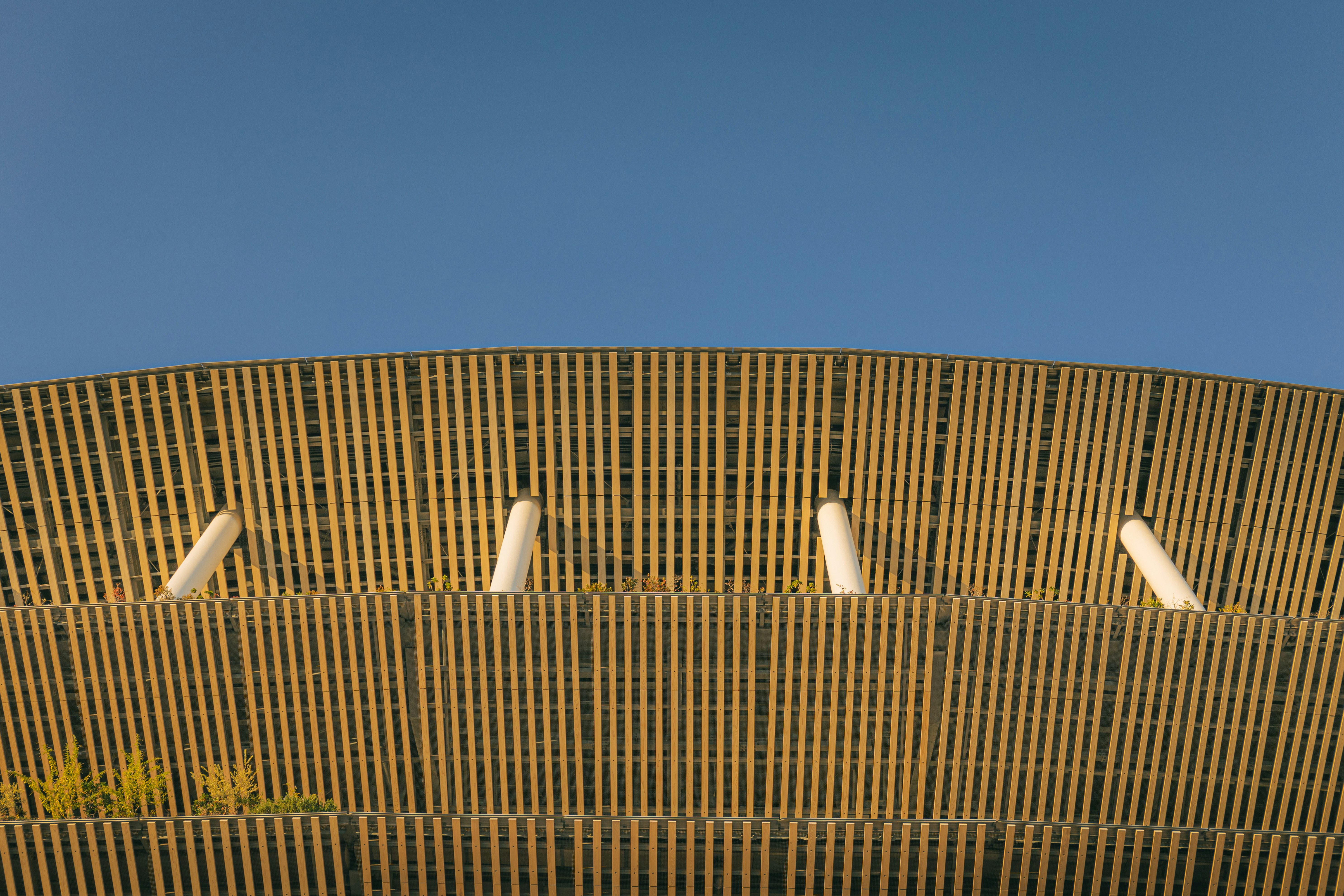 A close up of a building made of bamboo