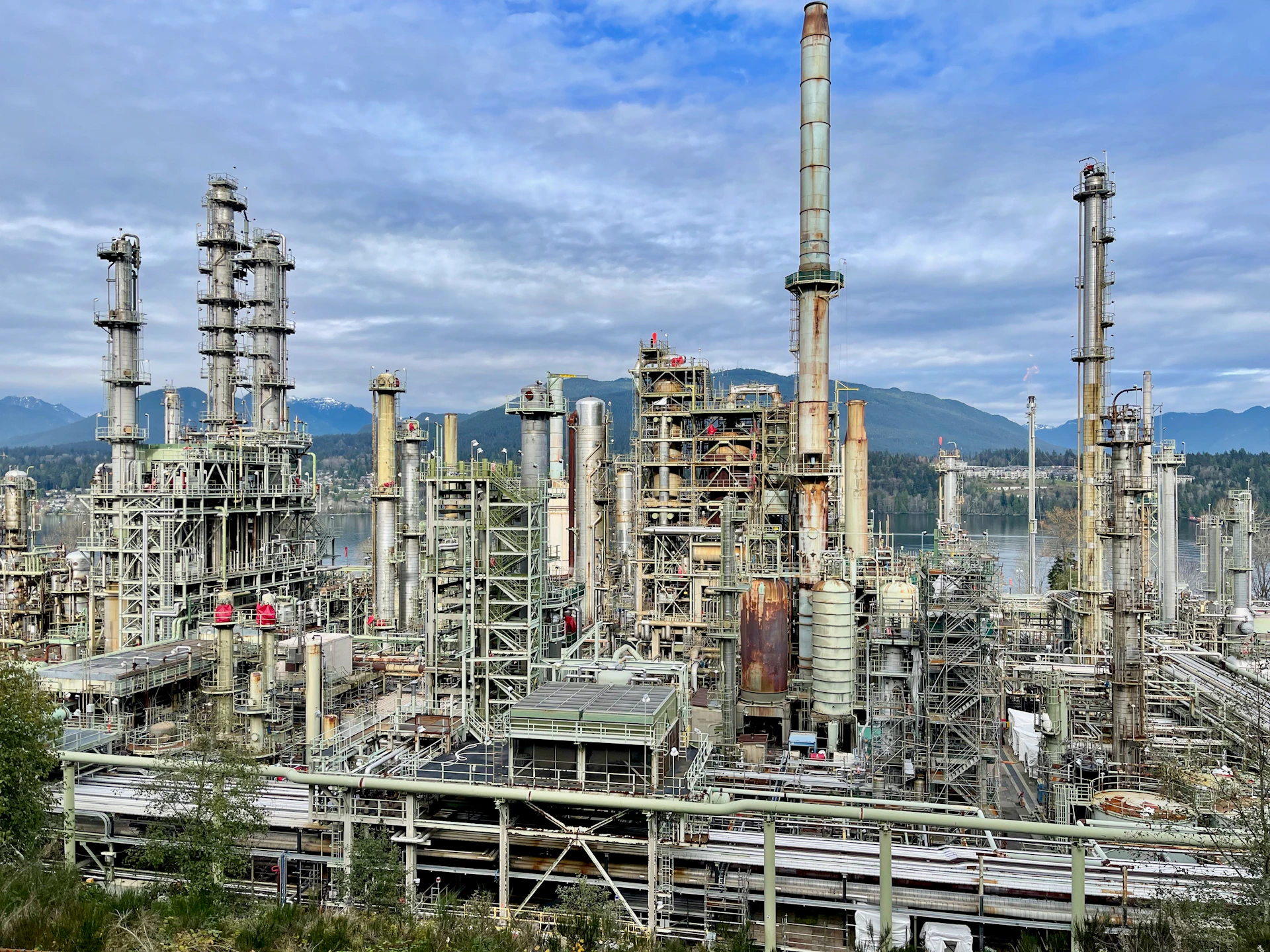 A large industrial area with a lot of tall buildings