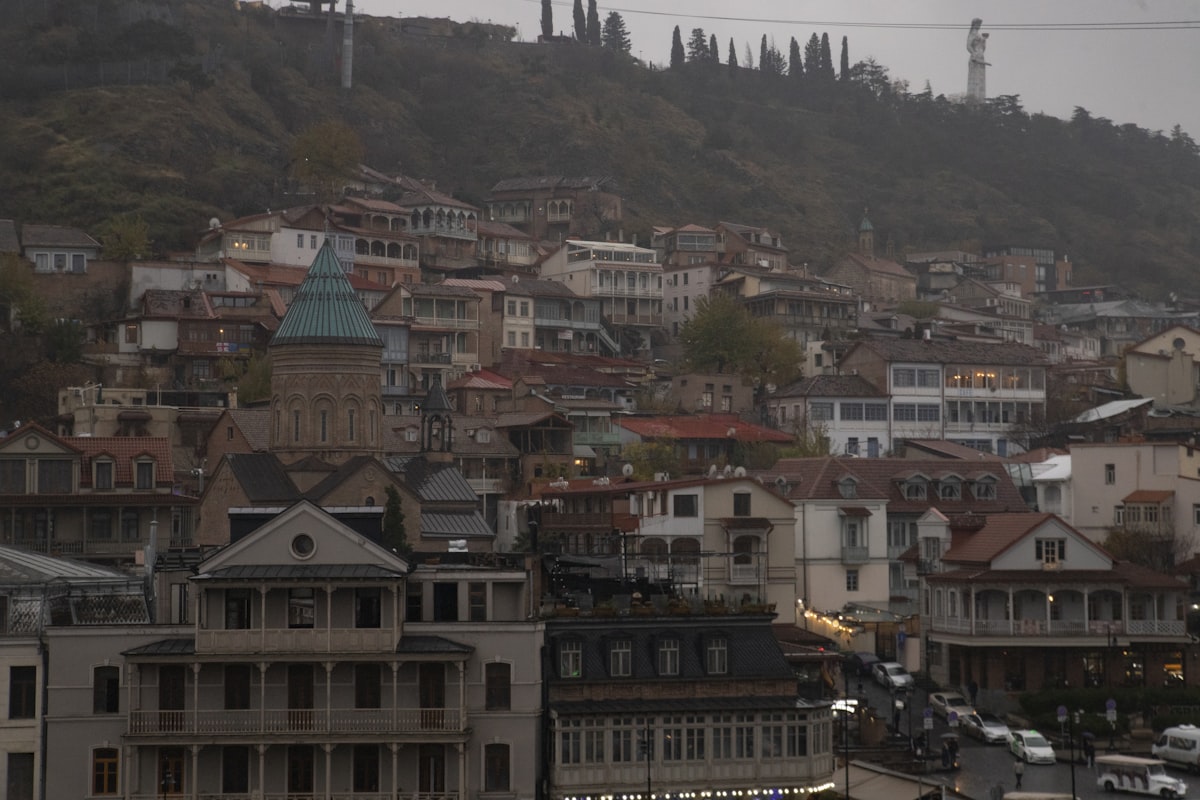 Tbilisi January — Old Town rooftops and Narikala Fortress under grey winter skies