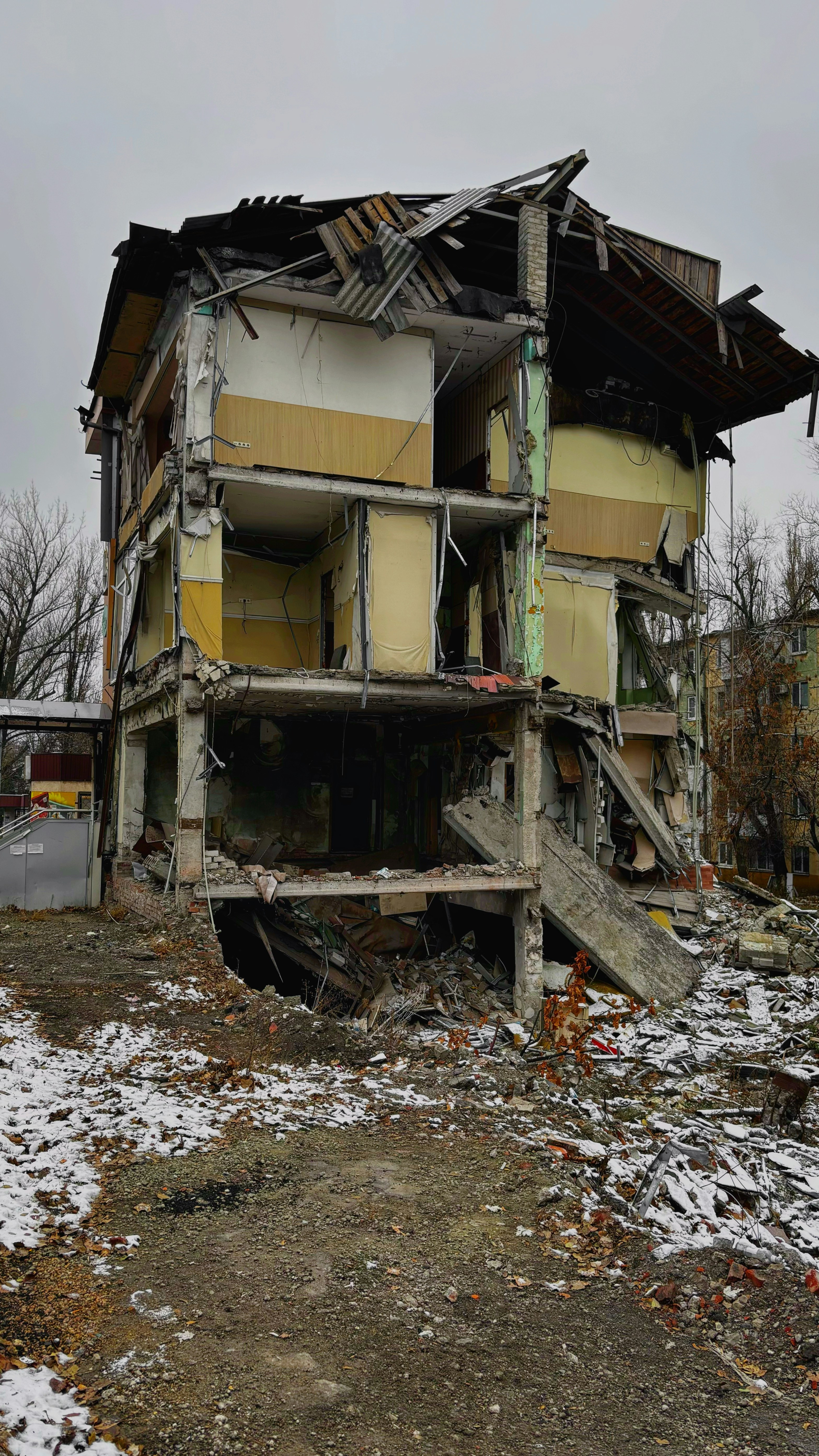 A run down building with a lot of debris on the ground photo – Free ...