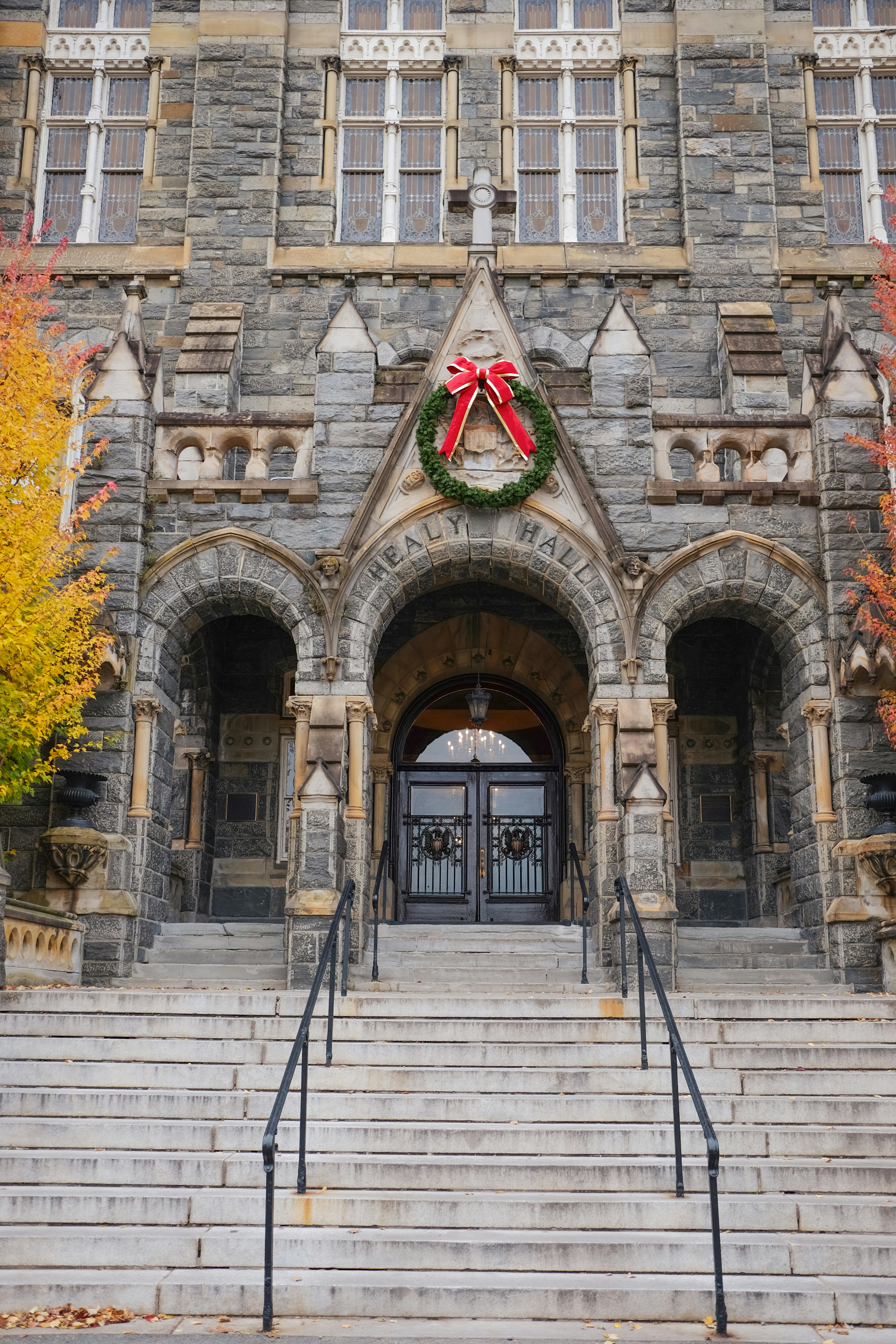 A large building with stairs and a wreath on it photo – Free Georgetown ...