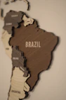 A wooden map of the world with countries