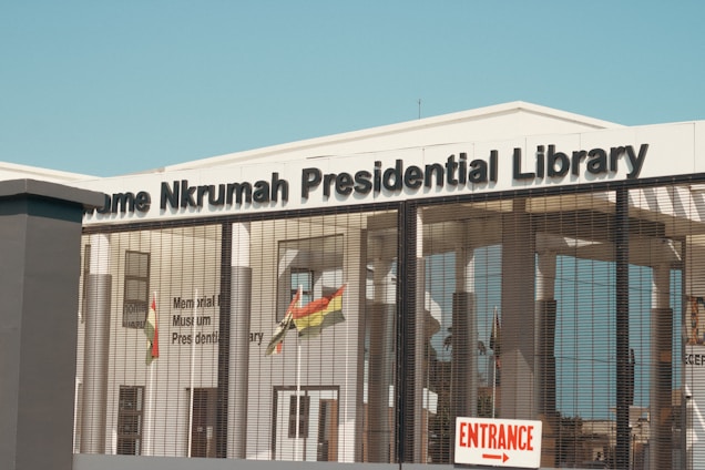 A large building with a sign on the front of it