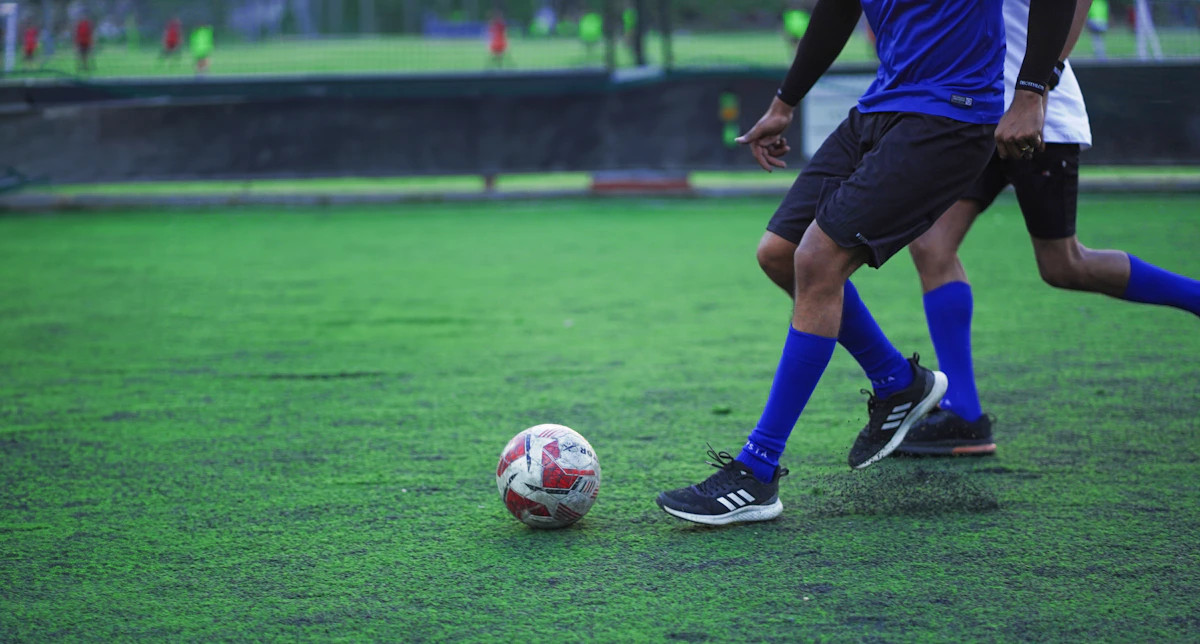 Football players training on an open field