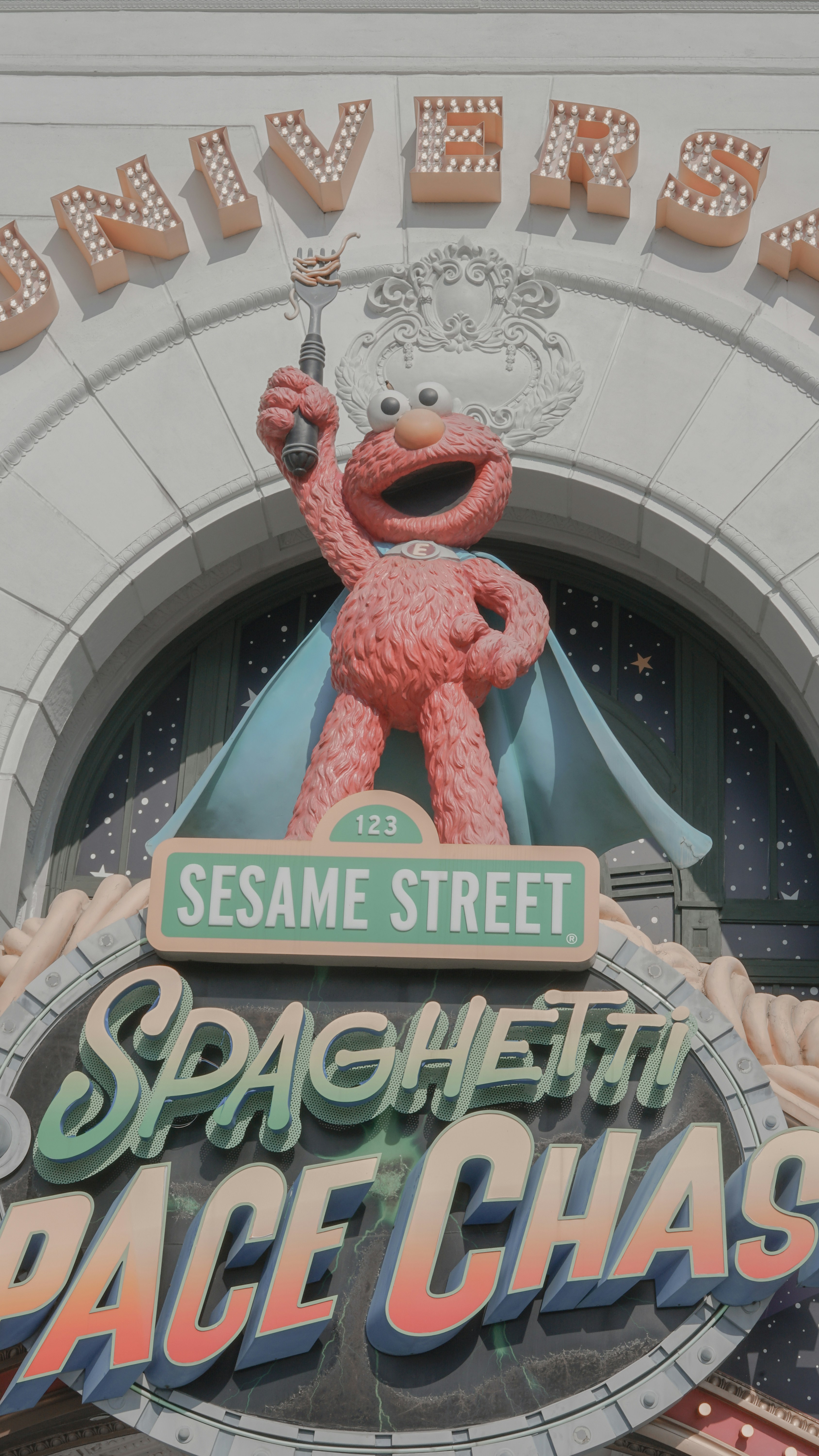 The sesame street spaghetti place has a giant sign