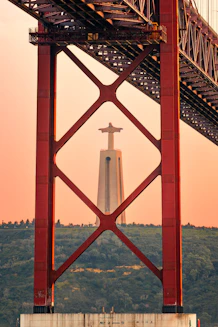 A large bridge with a tower on top of it