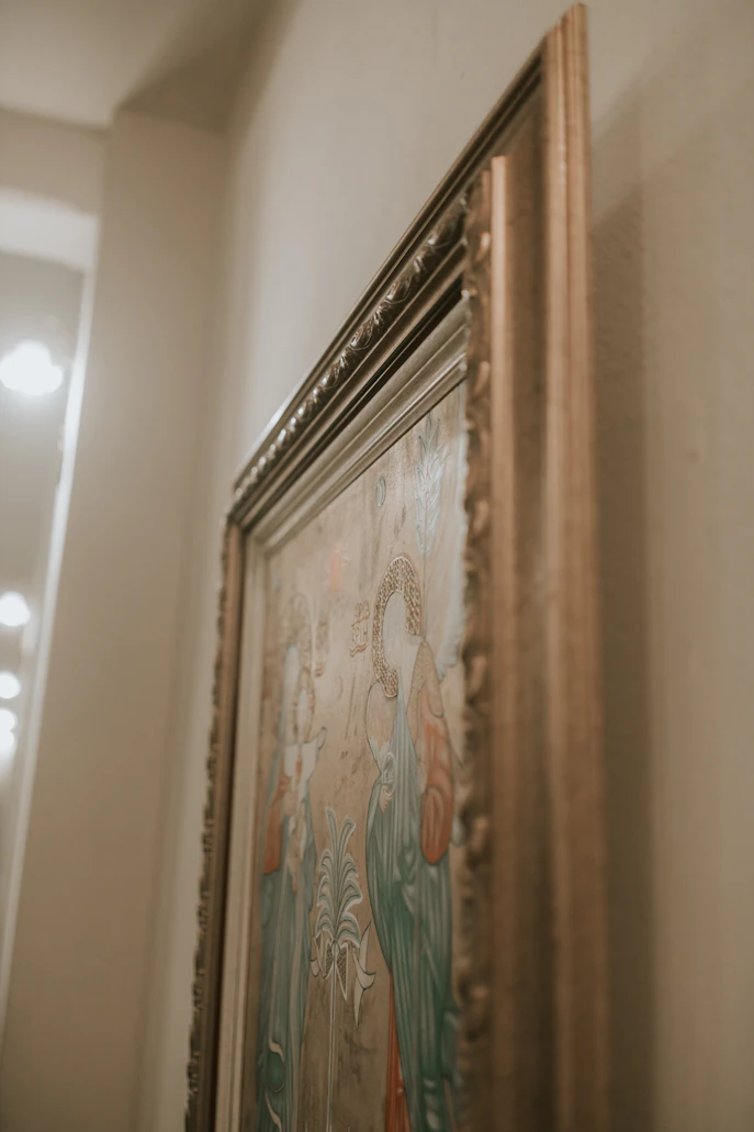 Original paintings in a considered gallery arrangement
