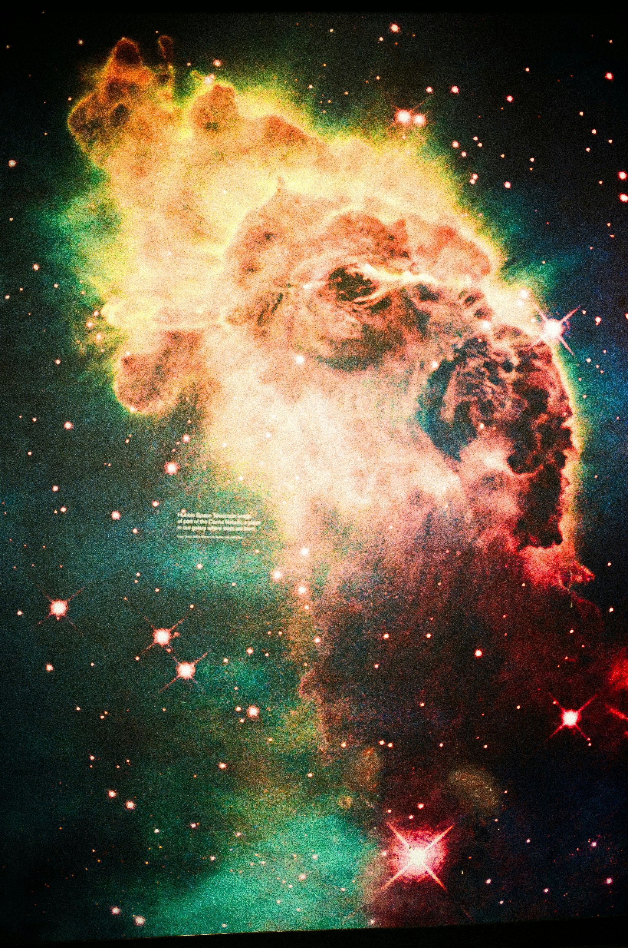 A colorful picture of a star cluster in the sky