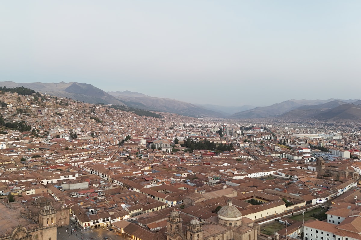 Miraflores Wanchaq Cusco — aerial view of the modern city spreading across the Andean valley beyond the historic centre