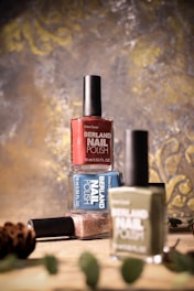 A bottle of nail polish sitting on top of a table