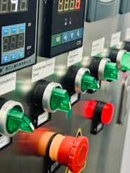 A row of gas pumps sitting next to each other