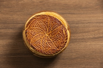 A wooden box with a decorative pattern on it