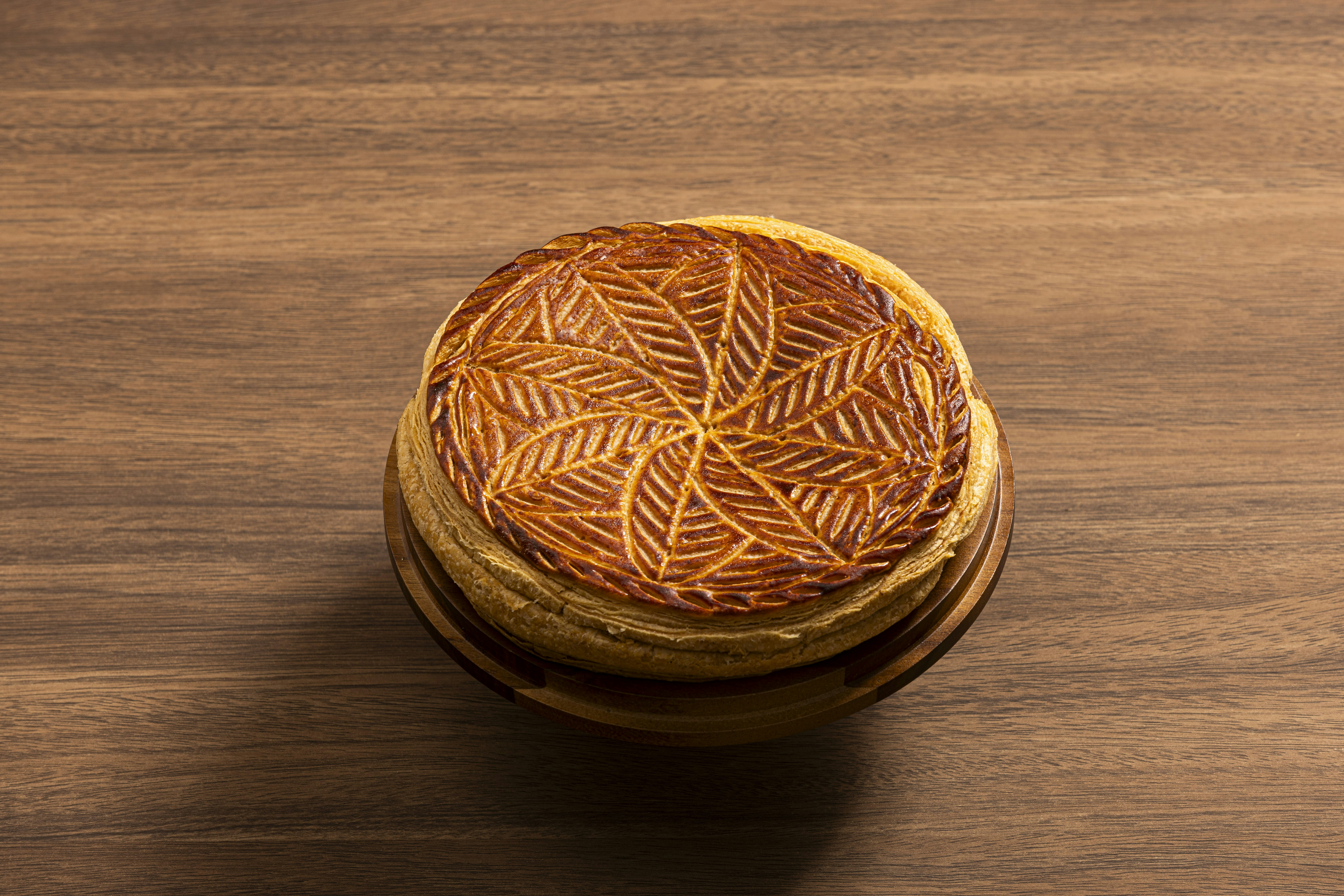 A close up of a wooden object on a table