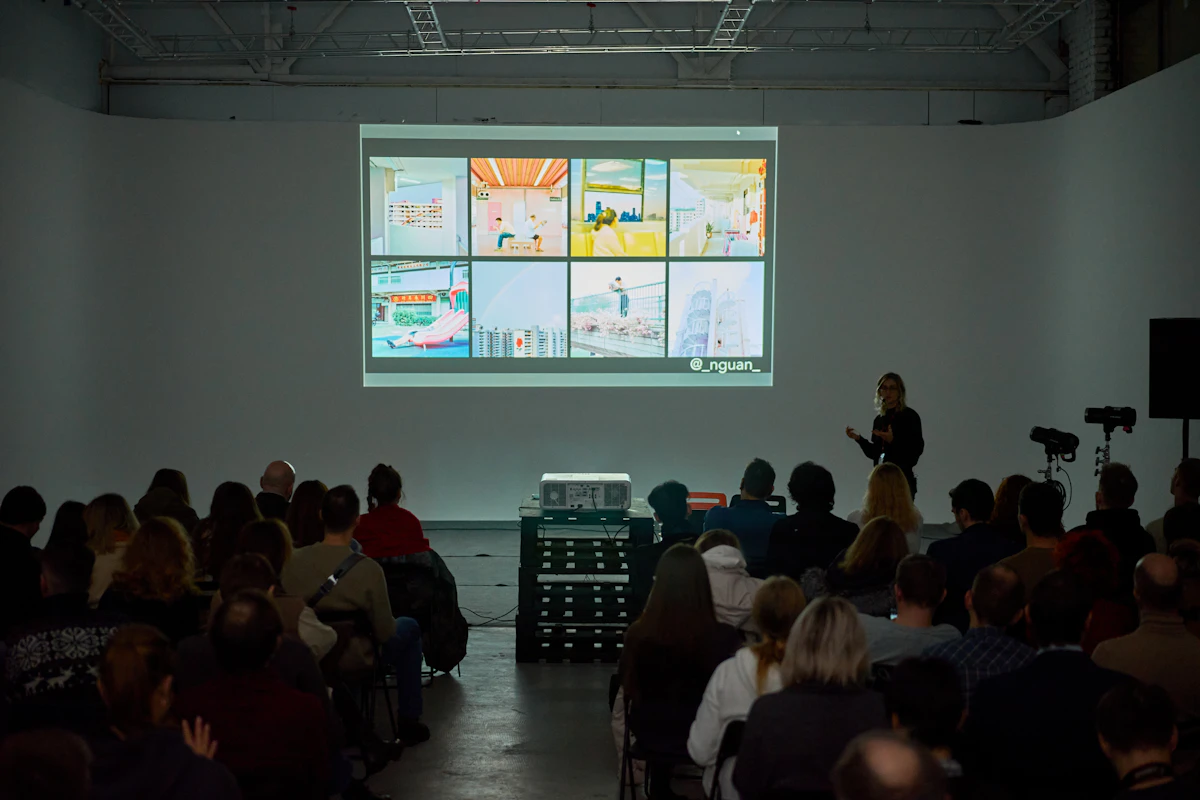 Audience watching a presentation screen in a training room