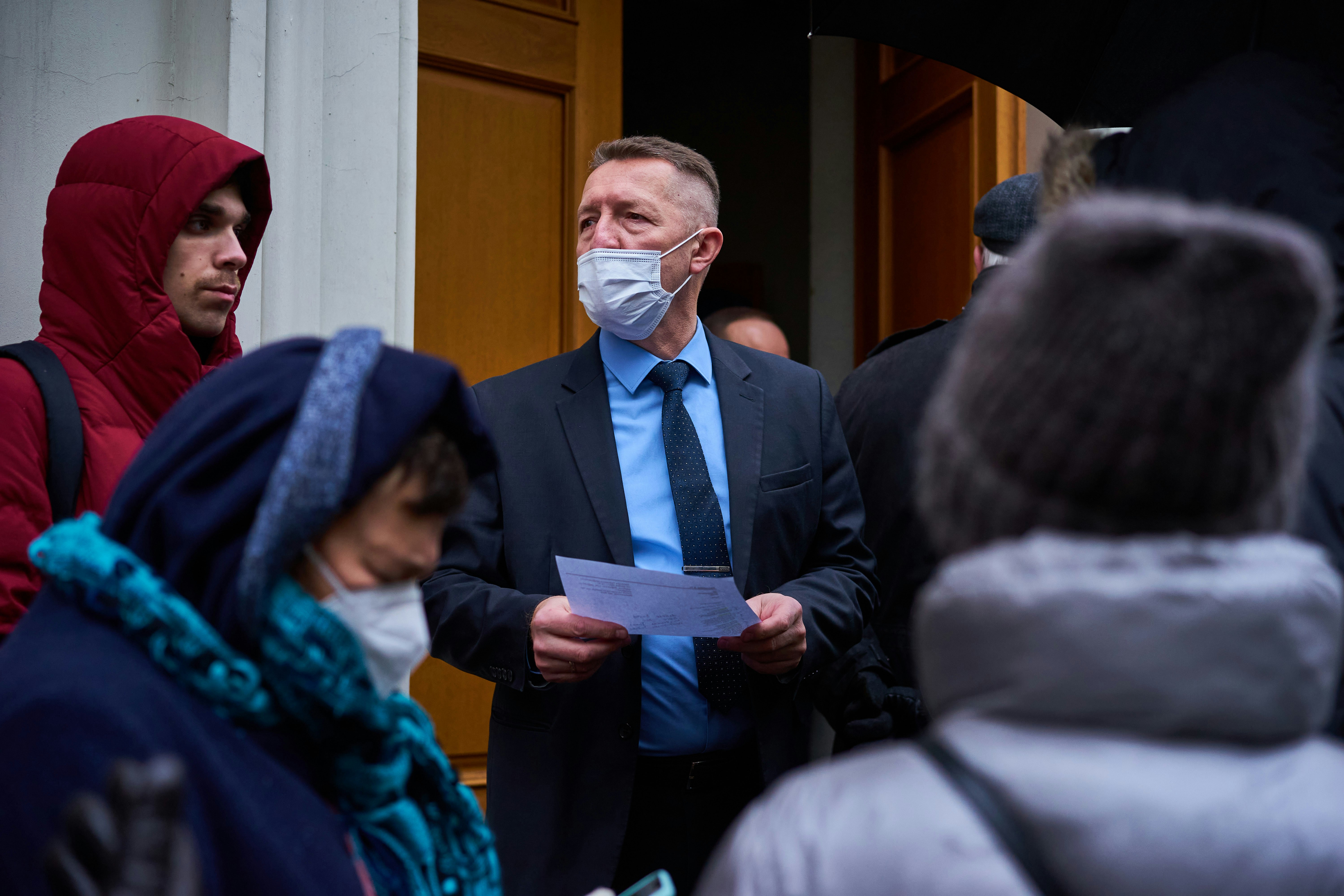 A group of people standing outside of a building (Photo by Valery Tenevoy on Unsplash)